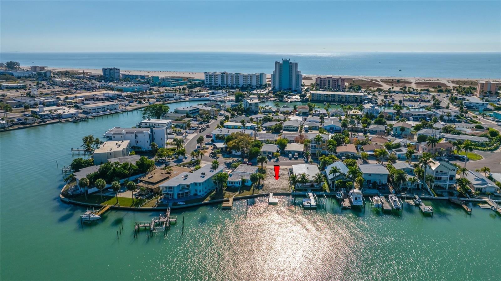 Welcome to a true waterfront wonderland on Isle of Palms in Treasure Island. Perfectly positioned just a short boat ride from the Gulf of Mexico and an easy stroll to the beach, this exceptional location offers the best of Florida coastal living. Spend your days soaking up the sun and surf, then unwind in the evenings as technicolor sunsets paint the sky. Treasure Island is a fun, funky, and friendly community known for its locally owned restaurants serving fresh-caught seafood, lively waterfront watering holes, live music, and locally brewed beer. The wide, sugar-white sandy beaches are consistently ranked among the best in the country, and the town proudly holds the title of Florida’s Sand Sculpting Capital, hosting a world-renowned international festival each fall. This is your opportunity to build a custom waterfront home and create the seaside sanctuary you’ve been dreaming of. Isn’t this the location you’ve been waiting for? Kick off your shoes, slow your pace, and embrace the ultimate beach life.