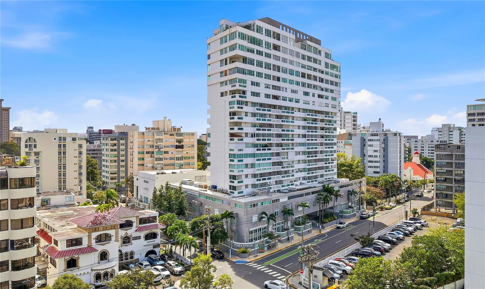 Conveniently located within the heart of Condado Beach, this tasteful 3-bed convertible to 4, 4.5-bath residence's prime location offers a truly cosmopolitan way of life at Plaza Stella. Affording two entry points, the unique 3-level layout features approx. 2,700 Sq. Ft. of total construction highlighted by scenic city views. Showcasing a contemporary design aesthetic, the fully equipped eat-in kitchen and open-concept living/dining area with powder room and patio on the first level provide the ideal setting for entertainment or intimate gatherings. The second level houses the primary suite, as well as a generously-sized flex space with full bath that can be converted into an additional bedroom. The two remaining bedrooms are situated on the third floor, along with a dedicated laundry room. Each bedroom is ensuite with a walk-in closet. Four parking spaces round out this exceptional offering. Plaza Stella is a full-service building in Condado Beach with 24-hour security, fitness center and pool. It is located near St. Johns and Robinson School, in addition to top restaurants, hospital, supermarkets, La Hacienda Gourmet Food Market, Freshmart Organic Produce Store, shopping establishments and entertainment venues. Within close proximity to the beach and a variety of aquatic activities. Moments away from the Miramar Arts District, Old San Juan and Isla Verde.