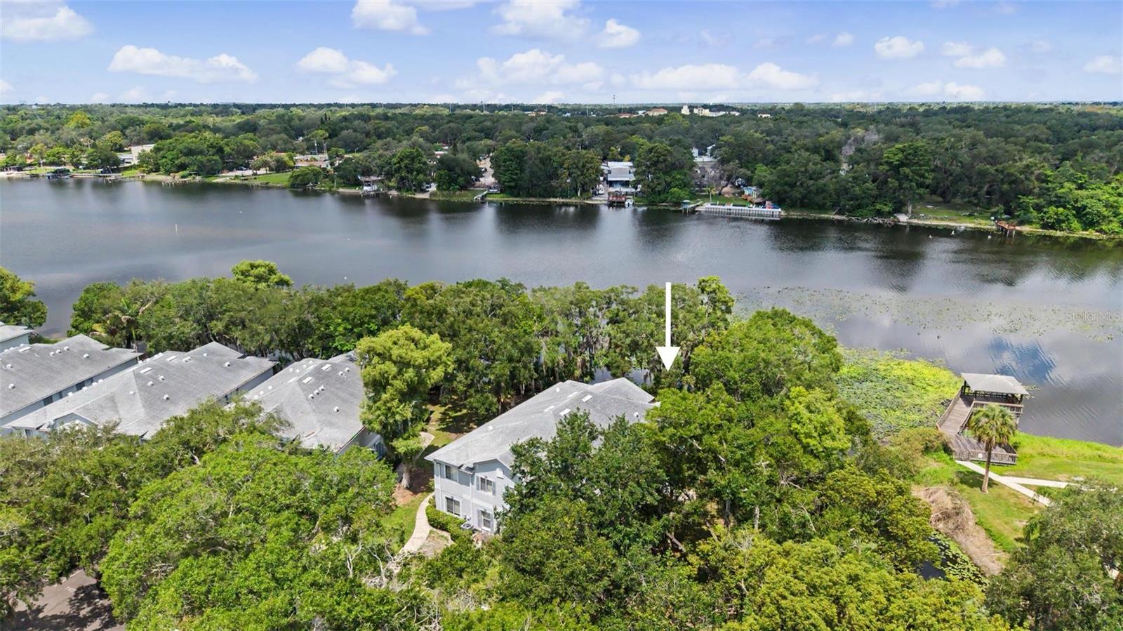 Welcome to waterfront living at its finest! This beautiful end-unit condo offers 3 bedrooms, 2.5 bathrooms, and a bright open floor plan designed for comfortable everyday living. The main level is filled with natural light & features, a spacious living room, dining area,  an inviting kitchen complete with stainless steel appliances, ceramic tile flooring, & a brand-new backsplash. A convenient half bath completes the first floor. Upstairs, you’ll find all three bedrooms, including a spacious primary suite with a walk-in closet & a private full bathroom. Luxury vinyl flooring runs throughout the second level, which also includes a second full bathroom & a laundry area conveniently located just outside the bedrooms. The staircase has been enhanced with beautiful new hardwood flooring, and the entire ground floor has been freshly painted. From the moment you step through the front door, you’ll feel like you’re on vacation. Enjoy your morning coffee while taking in the tranquil water views from your own private outdoor sitting area. Just steps from your door, you’ll find a playground & the community pool, offering endless opportunities for relaxation and recreation. Perfectly located near parks, golf courses, casinos, shopping, & dining, this exceptional waterfront condo combines convenience, comfort, & scenic beauty. Don’t miss the opportunity to make this stunning home your own!