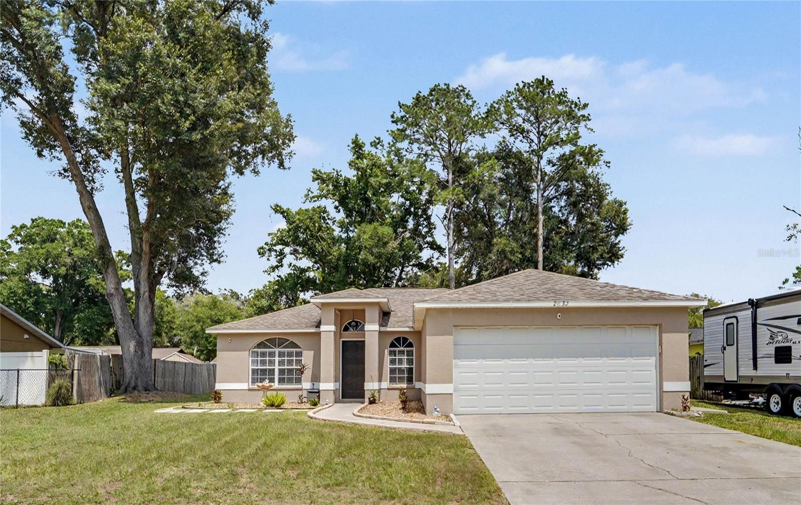 Welcome to Glenview Drive, a wonderful opportunity in Land O’ Lakes with no HOA and no CDD fees. This well-maintained 3-bedroom, 2-bath home offers a comfortable and functional layout, plus an enclosed flex room with closet and window that provides valuable extra space for today’s lifestyle.

Whether you need a home office, nursery, playroom, guest space, hobby room, or additional storage, this property offers the flexibility to make it your own.
Important updates include a new A/C in 2025, a roof replaced in 2019, and recently replaced flooring, adding peace of mind and appeal for the next owner. The property also features an attached 2-car garage and a convenient location near shopping, dining, schools, and major commuter routes.
A great opportunity for buyers looking for comfort, value, and flexibility in a desirable Land O’ Lakes location.
Buyer to verify all information related to room count, square footage, permits, and intended use.