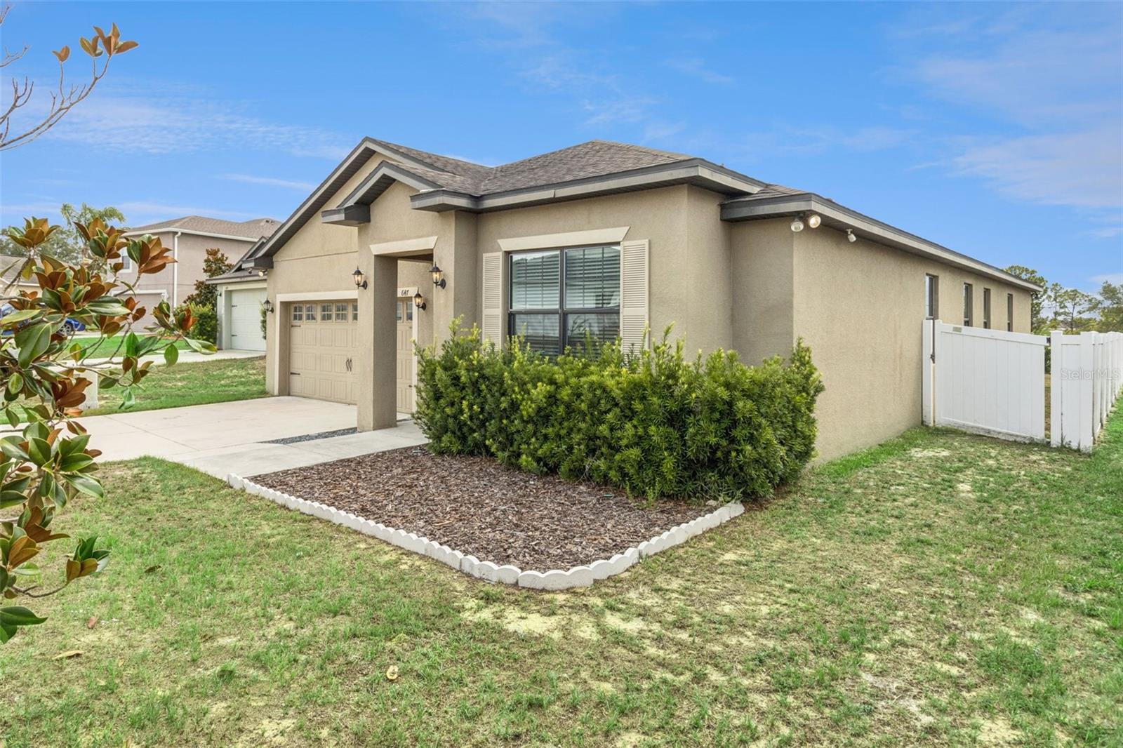 Welcome home to this beautifully updated 4-bedroom, 2-bathroom residence in the heart of Dundee where comfort, style, and convenience come together. Perfectly positioned in one of Central Florida's most thriving and growing communities, you'll enjoy a peaceful hometown feel while remaining just minutes from Winter Haven, Lake Wales, and Haines City with easy access to US-27, Interstate 4, and nearby major highways for convenient commuting to Orlando, Lakeland, Tampa, and Florida's famous coastlines. 

Inside, you'll find an inviting open layout designed for both everyday living and entertaining. The expansive living room is a true showpiece, featuring a dramatic tray ceiling that creates an impressive sense of space and elegance. The updated kitchen offers modern finishes, and ample cabinetry connected to a sizeable dining space for plenty of room to gather with family and friends.

The spacious primary suite is a private retreat, boasting an oversized bedroom, a generous walk-in closet, and a gorgeously remodeled en suite bathroom with beautiful, contemporary finishes. Three additional bedrooms provide flexibility for guests, a home office, growing families, or multigenerational households.

Located in a vibrant and continually evolving area, you'll be close to scenic lakes, local parks, shopping, dining, and recreational opportunities while enjoying the charm and affordability that make Dundee one of Polk County's most prized hidden gems. Whether you're looking for your first home, your next home, or a place to enjoy the best of Central Florida living, this move-in-ready property is one you won't want to miss.