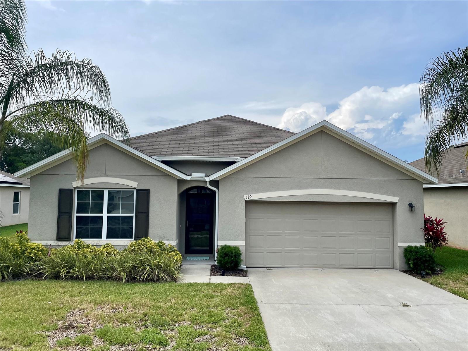 This Cali Express model by D.R. Horton offers a smart triple-split floor plan designed for ultimate privacy, making it ideal for families, guests, or a home office setup. The heart of the home features an open-concept kitchen, living, and dining area, perfect for everyday living or entertaining. The kitchen is complete with all appliances included, a large island with seating, and ample cabinetry. The spacious primary suite boasts a large walk-in closet and en-suite bath, providing a peaceful retreat. Secondary bedrooms are generously sized with easy access to full bathrooms and convenient linen storage. Additional features include: Separate laundry room, concrete block construction with stucco, energy-efficient upgrades such as double-pane insulated windows and blown-in insulation and air conditioned garage, perfect for the car enthusiast or handyman. Enjoy the security and serenity of a gated community, with community dock on the Indian River and just minutes from shopping, schools, and the Intracoastal. Whether you're a first-time buyer, looking for a second home in a quiet community or looking to simplify, this home checks all the boxes. Schedule your private tour today and discover why 119 Fishermans Cove feels like home!