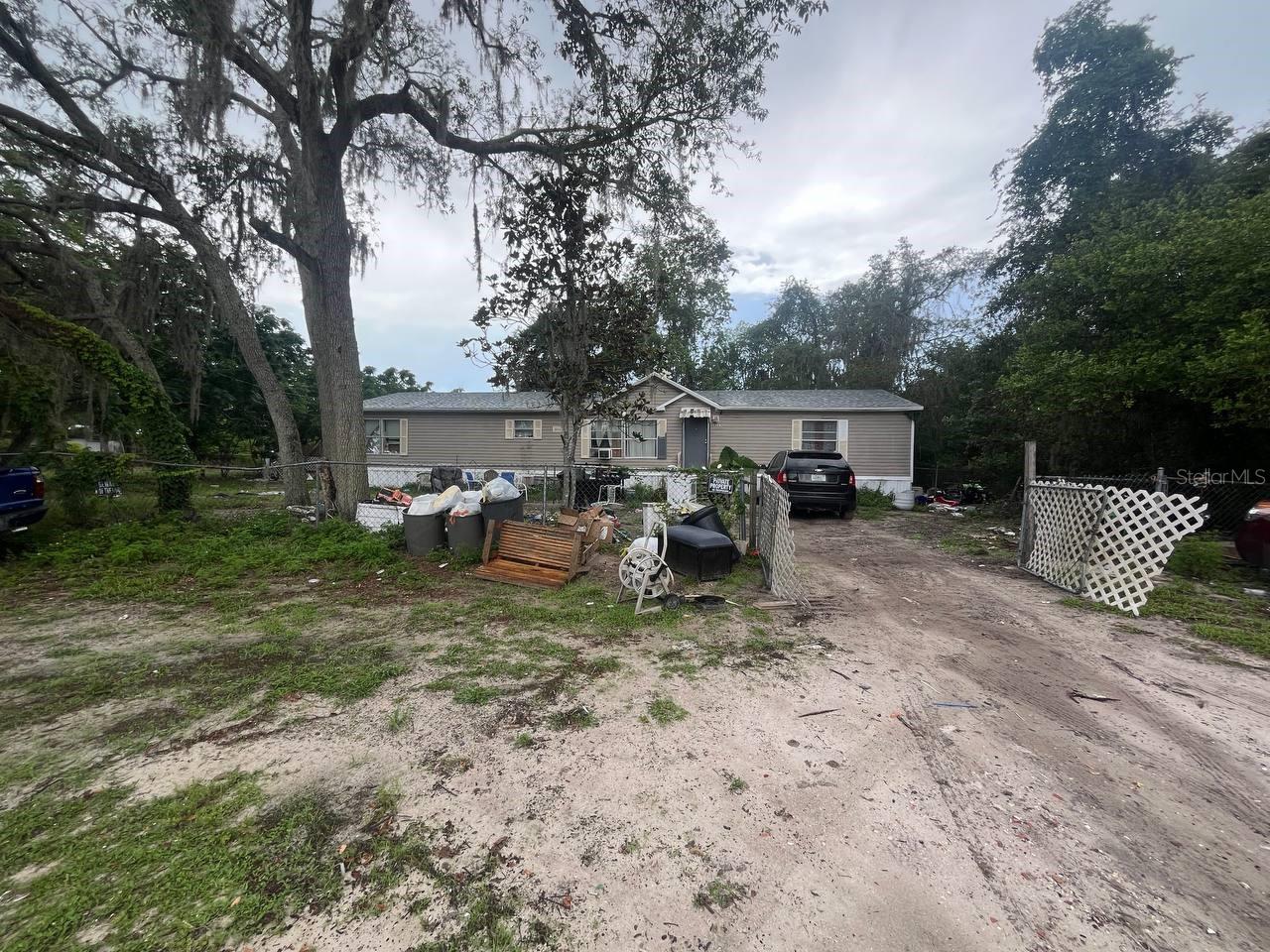 Mobile home with a brand new roof already in place and plenty of built-in equity waiting to be unlocked. Needs full cosmetic updates and a new HVAC unit perfect for a handyman buyer ready to add instant value. Situated in Moon Lake Estates within unincorporated Pasco County, this is a no-HOA rural setting in the growing Tampa Bay/Pasco County market.  Sale is as-is.