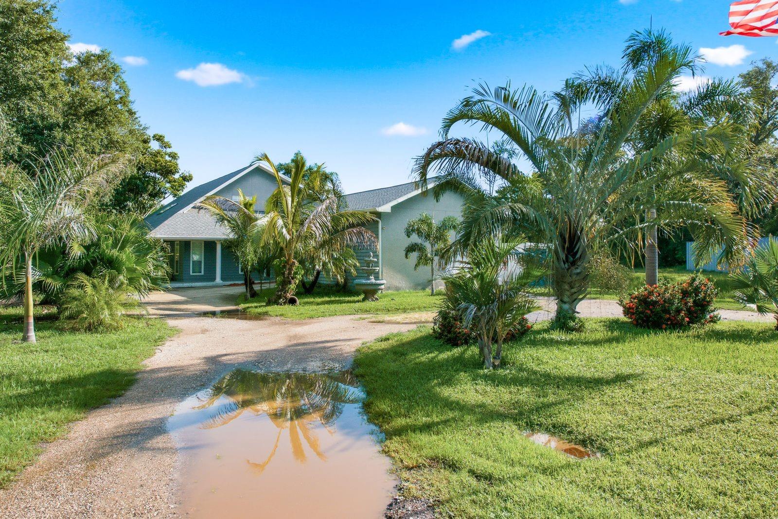 Tucked away at the end of a quiet dead-end street, this exceptional five-bedroom, two-and-a-half-bath residence offers something increasingly difficult to find in Pinellas County—privacy, space, and convenience, all on nearly half an acre. With over 3,200 square feet of living space, a three-car garage, and an incredible backyard retreat, this home blends everyday comfort with resort-style living just minutes from everything Tampa Bay has to offer. The property is identified in public records as a single-family home with approximately 3,248 square feet, a three-car garage, and a pool on a 0.46-acre lot.

Inside, generous living spaces are designed for both entertaining and daily life. Large sliding glass doors seamlessly connect the interior to the expansive screened outdoor living area, creating the perfect Florida indoor-outdoor lifestyle. Whether you're hosting family gatherings, relaxing after work, or enjoying weekend pool parties, the backyard becomes an extension of the home.

The heated swimming pool and heated spa provide year-round enjoyment, while the private setting—with no rear neighbors—creates a peaceful escape rarely found in such a central location. Mature landscaping and the oversized homesite make the backyard feel like your own private resort.

This home has already benefited from several important improvements, including a new roof in 2026, one air conditioning system replaced in 2020, a water heater approximately four years old, and professional termite tenting completed in May 2026, giving buyers added confidence as they move into their next home.

The spacious floor plan offers tremendous flexibility for growing families, multigenerational living, home offices, fitness spaces, or hobby rooms. The kitchen comes complete with the refrigerator, range, hood, dishwasher, washer, and dryer, making your move even easier.

One of the greatest advantages of this home is its location. Although you'll enjoy the peace and quiet of a true dead-end street, you're only minutes from shopping, restaurants, grocery stores, the library, the post office, parks, medical facilities, schools, and major commuter routes. Whether you're heading to downtown St. Petersburg, Clearwater, Tampa, Tampa International Airport, or some of Florida's award-winning Gulf beaches, you'll appreciate the convenience of living in the heart of Pinellas County.

Homes that combine this amount of square footage, five true bedrooms, nearly half an acre, a three-car garage with 2nd floor loft, a heated pool and spa, and an exceptionally private setting are becoming increasingly rare. If you've been searching for a home that offers room to grow, room to entertain, and room to relax, 6451 76th Terrace North is an opportunity you won't want to miss.

Schedule your private showing today and experience one of Pinellas Park's hidden gems for yourself.