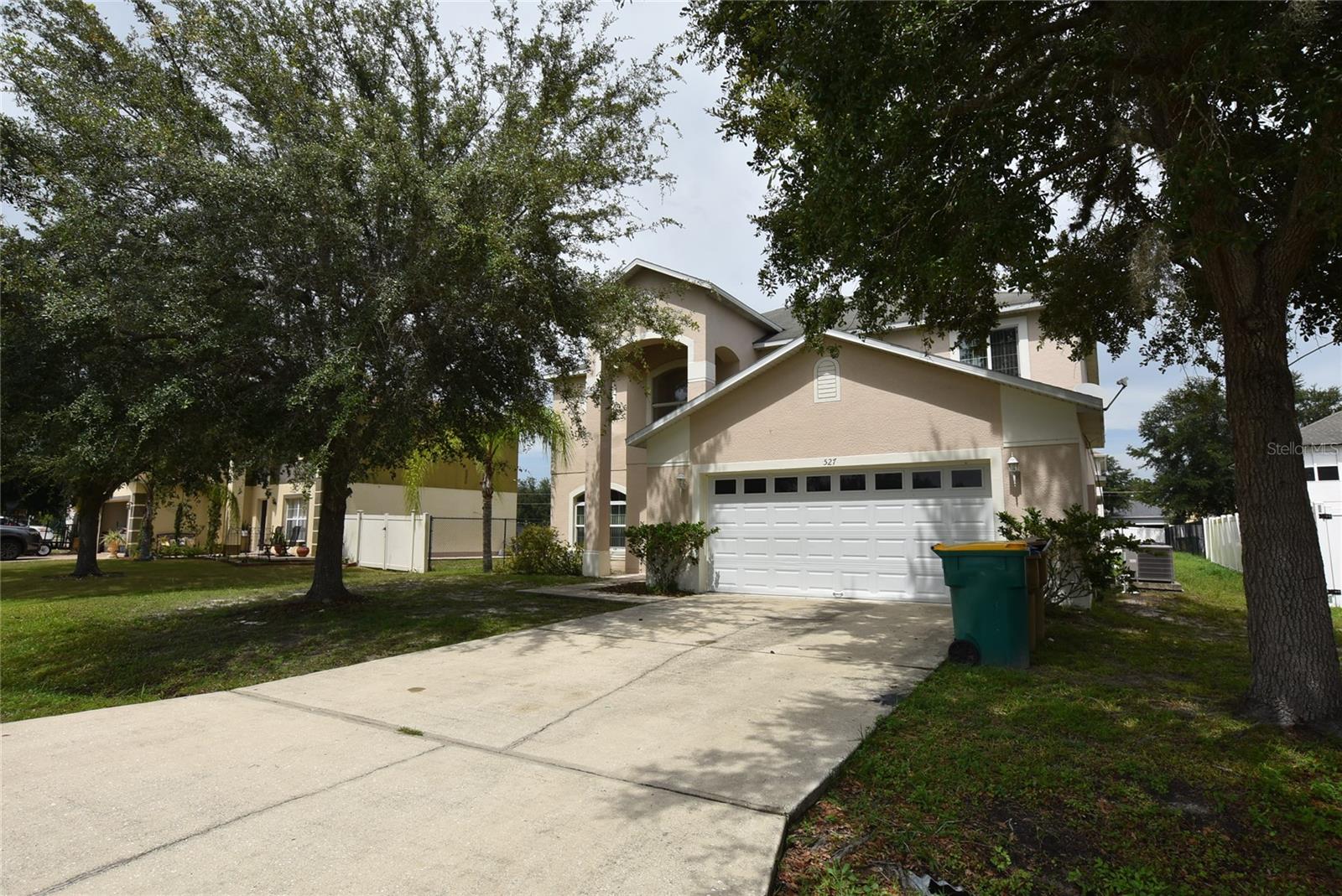 Stunning well maintained like new large 2-story Home, 4 bedrooms and 2.5 Baths. Kitchen with Granite Counter Tops, kitchen appliances and pantry, Breakfast area, open to Great Family Room. Large Living / Dining. inside laundry with washer & dryer hookups. Wall-to-wall Ceramic floors the entire downstairs area. The stairs & all upstairs floors are carpeted. Split master suite with Master Bath. Loft can be a private family room upstairs. The property is conveniently located with access to Cypress Parkway and toll Ronald Regan Pkwy to Disney and I-4. Area Shopping centers, schools and restaurants.