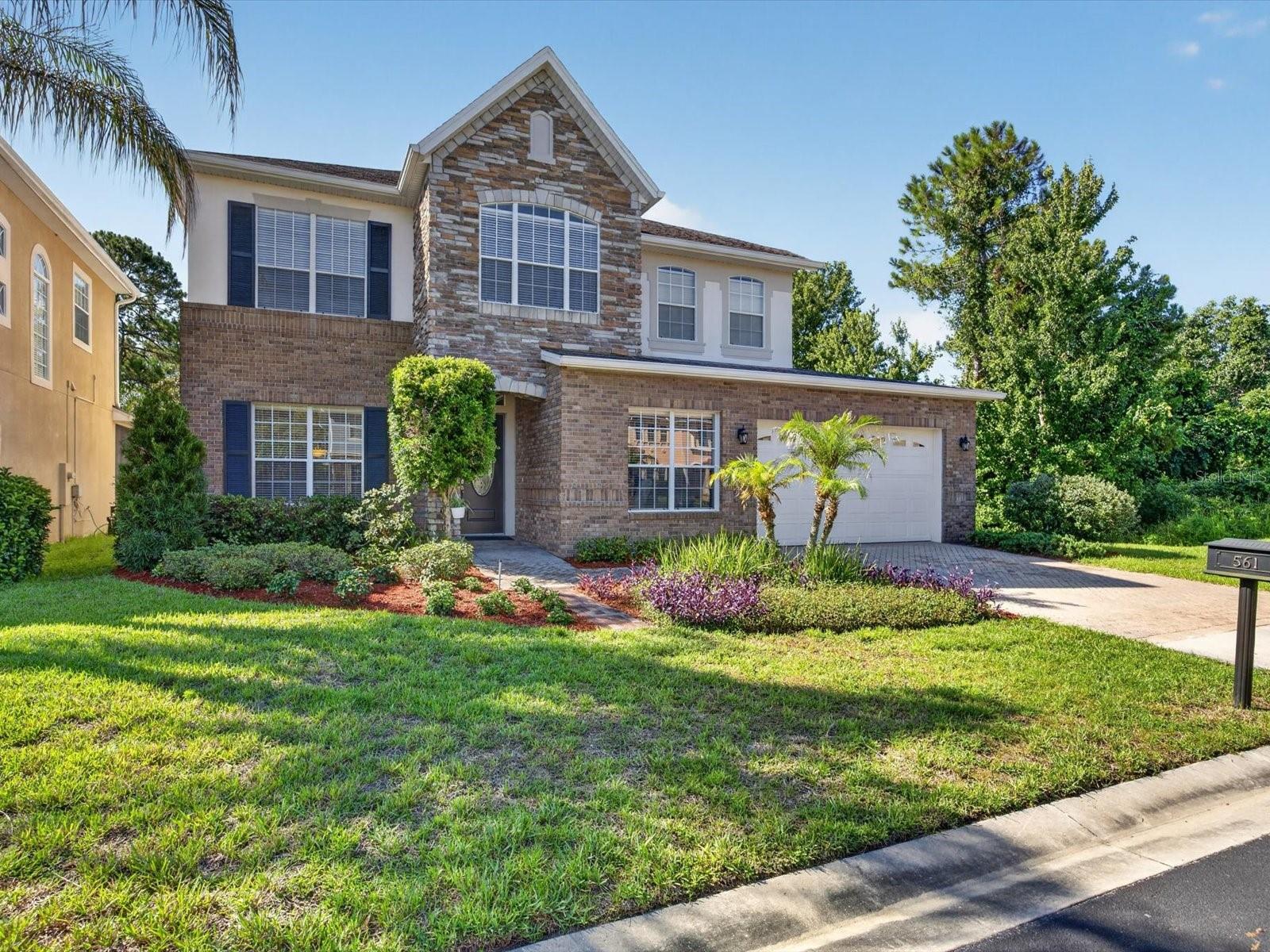 Positioned on a private cul-de-sac homesite within Providence, one of Central Florida's premier gated golf communities, this Toll Brothers-built Summerbrooke floor plan offers nearly 3,600 square feet of thoughtfully designed living space, exceptional privacy, and a resort-style outdoor retreat. Surrounded by conservation on the side and rear, with only one neighboring home, this property delivers a rare combination of space, tranquility, and convenience.

From the moment you enter, you'll appreciate the home's thoughtful design, 10-foot ceilings, upgraded flooring, and abundance of natural light. Formal living and dining rooms create elegant spaces for entertaining, while the spacious family room serves as the heart of the home and flows seamlessly into the kitchen and breakfast area.

The chef's kitchen has been designed to impress, featuring rich solid wood maple cabinetry, granite countertops, stainless steel appliances, double wall ovens, a center island, extensive storage, and a spacious café overlooking the pool and conservation views. Just beyond the kitchen, a custom-built wine bar tucked beneath the staircase creates the perfect space for entertaining guests or showcasing your collection.

Privately located on the first floor, the oversized primary suite offers a true retreat with generous proportions, a large walk-in closet, and a spacious en-suite bath. A separate office, study, or flex room downstairs provides versatility for remote work, hobbies, or a private sitting room.

Sliding glass doors open to an expansive screened lanai where Florida living takes center stage. The heated south-facing pool and spa provide year-round enjoyment, while the covered patio offers a shaded space for outdoor dining and relaxation. Conservation views create a peaceful backdrop rarely found in today's market.

Upstairs, three spacious bedrooms await, all offering generous accommodations for family and guests. Two bedrooms feature walk-in closets and share a Jack-and-Jill bathroom, while the third enjoys a private en-suite bath. A 16' x 16' loft with dry bar and bamboo flooring creates an ideal second living area, parlor, media room, game room, or study space.

Additional features include a two-car garage, updated HVAC systems (2018 and 2023), generous storage throughout, and a functional floor plan designed for both everyday living and entertaining.

Residents of Providence enjoy 24-hour guarded gate access, a championship golf course, clubhouse, resort-style pool, fitness center, tennis courts, playgrounds, walking trails, and a vibrant community atmosphere. Conveniently located near shopping, dining, major highways, and Central Florida attractions, Providence continues to be one of the area's most sought-after master-planned communities.

This is a rare opportunity to own one of Providence's most desirable Toll Brothers floor plans on a premium conservation homesite with exceptional privacy, luxury features, and resort-style outdoor living.