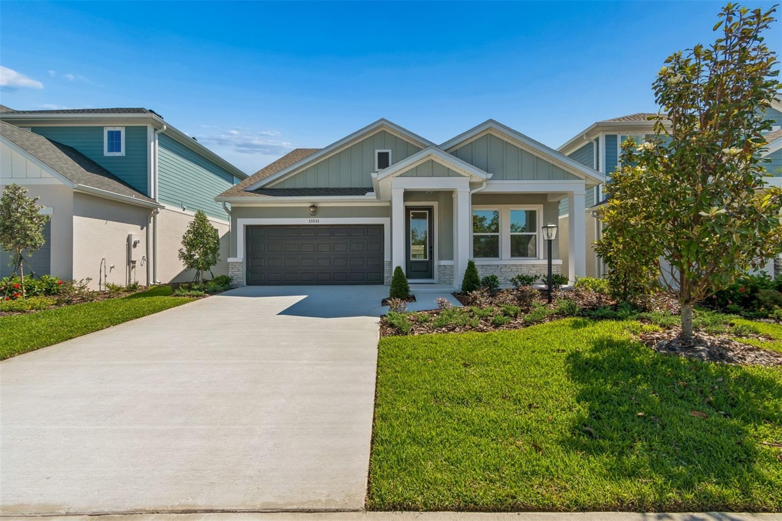 Discover the Allman by David Weekley Homes at Eastlyn in Bradenton, FL. We nicknamed this home, “The Clark Kent,” because of its unassuming nature from the street, however when you go inside you discover that it is much more than it appears! Just ten minutes from I-75 and SR 64 you'll find this two-story home beautifully designed for you, where modern elegance meets everyday functionality. With no CDD Fees and a low-HOA, Eastlyn provides a peaceful setting that's close enough to the highway to be convenient, yet far enough away to avoid the big city traffic. Only a 4-minute drive from groceries, or 10 minutes to the Costco/Target shopping center where you'll find a variety of stores and top restaurants. Easy access to Sarasota, St. Petersburg, and Tampa, allows you to enjoy big city amenities when you want them and serene relaxation when you don't. This spacious floor plan offers 3 bedrooms, 2.5 bathrooms, 3 car tandem garage and a large upstairs retreat that can serve as a game room, home theater, or quiet reading nook, all backed by David Weekley Homes' comprehensive 1-2-10 warranty. The chef in you is sure to love the upgraded gourmet kitchen – it’s a showstopper, featuring an electric cooktop, built in oven/microwave combo, quartz countertops, and a large island for entertaining or casual eating. The seamless flow into the open-concept dining and family areas. Outstanding use of windows and natural light gives you a feeling of warmth throughout. At the rear of the home, the Owner’s Retreat provides a private escape with a spa-inspired Super Shower, and a nice walk-in closet. The flooring choices throughout are sure to please with durable laminate flooring running through the main living spaces downstairs, blending style with practicality and tile is in the bathrooms and the bedrooms and upstairs are carpeted. Stepping out the back door you'll find a large lanai, perfect for morning coffee or evening conversations under the Florida sky. **This property offers a limited-time interest rate incentive.