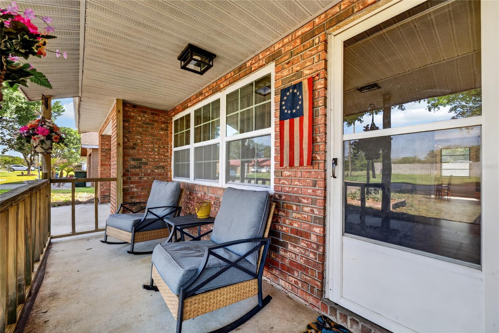 Don't wait to come see this move in ready home! Financing options include USDA/VA/FHA and down payment assistance is available, plus there is no HOA or CDD! Seller is willing to help buyers cover closing costs or rate buy down!
This home  offers solid brick construction, thoughtfully updated interiors, and outdoor spaces designed for real Florida living.  It has been carefully updated to reflect modern comfort while preserving its original character. 
Imagine mornings beginning on the covered front porch—coffee in hand. 
 As you step inside, the interiors unfold with intention—warm wood flooring leads thru a  light-filled
living space that opens from the living room into a reimagined kitchen  with an eat-in area , where clean-lined white cabinetry, stainless steel appliances, and a refined hex tile backsplash create a space that feels both functional and refined.

The dining area is anchored by an original brick fireplace, complemented by a reclaimed wood chandelier. Off the dining room the enclosed sunroom creates flexibility—whether you need a quiet retreat, a guest space, a playroom, an office or somewhere to unwind at the end of the day. This is not included in the current square footage so this is an opportunity for a savvy buyer to  enlarge the size of the home, even add another bedroom, and gain instant equity.

Outdoors, the property transitions seamlessly into a fully fenced backyard designed for both relaxation and entertaining. A curated mix of patio, deck, pergola, and fire pit creates layered outdoor living, with ample space to further enhance—whether with a pool, garden, or additional storage for recreational assets.

Recent improvements, including a 2023 metal roof, updated electrical panel, fresh interior finishes, and full kitchen and bath renovations completed in 2025. This is a home that’s already been taken care of—so you can focus on enjoying it.