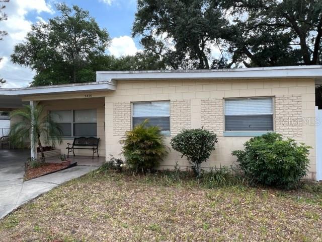 Accepting Backup Offers. Location! Location! Welcome to this unique opportunity to make this charming 1960, well built block home with 3 bedrooms and 2 baths your own! Located in a desirable area of Conwway with no HOA! This property is ready for you to customize and make it your own.  This home sits on a large fully fenced corner lot offering plenty of room to grow, maybe add a pool, park your boat and build a garage. The master bedroom also has its own entrance and could be used as a mother-in-law suite. There are laundry hook-ups located inside the kitchen as well as in the outside utility room providing you with the option of adding a pantry or a great workshop under the carport for all your projects. Recent updates include a new AC and hot water heater in 2020-21. The kitchen and guest bath have been remodeled including a great step-in shower and tile throughout the home. 
You'll love living close to all the amenities of Conway including downtown Orlando, shopping, restaurants and highly rated schools (Boone High), while being only 3 miles from Orlando International Airport. Don't wait any longer - come see what potential awaits you at this one-of-a-kind property today!