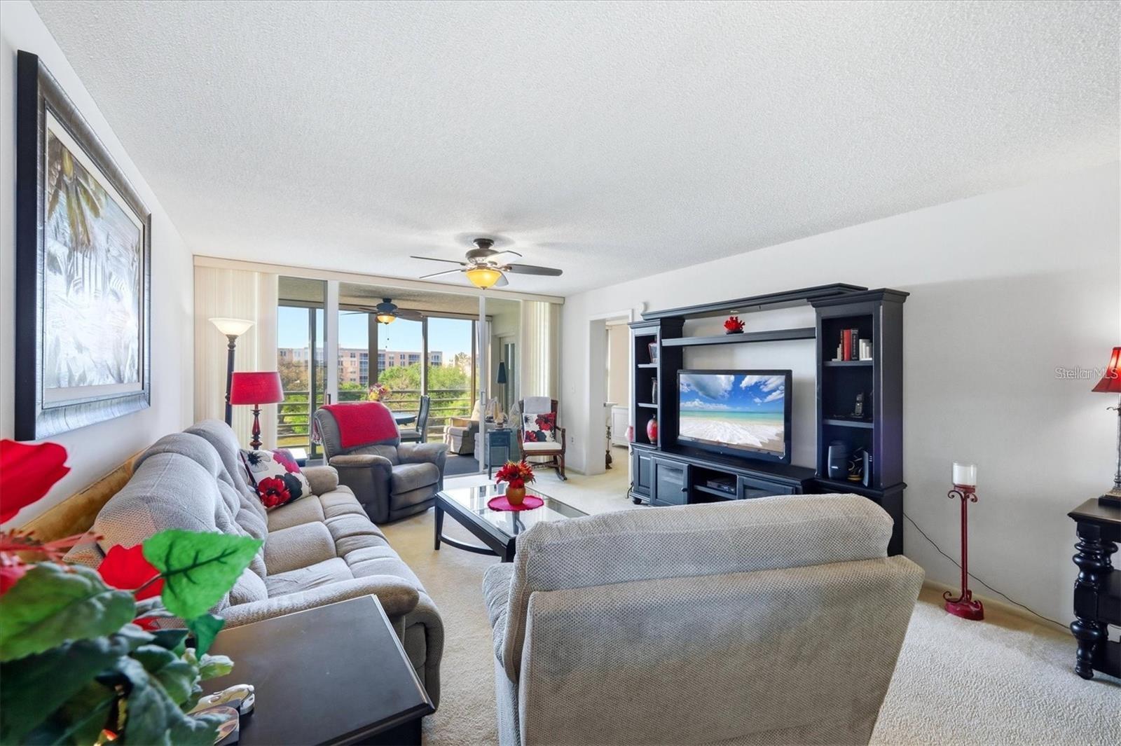 Welcome to The Fairways at Pinebrook, nestled within the highly sought-after Pinebrook Ironwood Golf Community in west Bradenton. This well-maintained third-floor condominium overlooks the scenic Pinebrook Ironwood Golf Course and is offered fully furnished, making it truly move-in ready.

Featuring the spacious Bayhill floor plan, this two-bedroom, two-bath residence offers an inviting open-concept design that flows from the foyer through the great room and into the glass-enclosed lanai, where you can relax and enjoy peaceful golf course views. The kitchen provides room for a breakfast table and features a convenient pass-through to the dining area, making entertaining easy.

The primary suite comfortably accommodates a king-size bed and includes a large walk-in closet, while the guest bedroom is generously sized for a queen bed, providing an ideal space for family and friends. A 7' x 7' utility room offers a washer, dryer, and additional storage space. The home also includes a private storage locker near the elevator, an assigned covered carport, and ample guest parking.

Residents of The Fairways enjoy exclusive access to their own private pool and sun deck, along with the outstanding amenities at the nearby Pinebrook Clubhouse, including a heated community pool. Recent 2023 building improvements include a new roof, exterior painting and caulking, a resurfaced parking lot, and upgraded elevator mechanicals.

The monthly condo fee covers nearly everything, allowing for carefree, maintenance-free living. Conveniently located near shopping, restaurants, medical facilities, Robinson Preserve, GT Bray Park, and the world famous Gulf Coast Beaches.