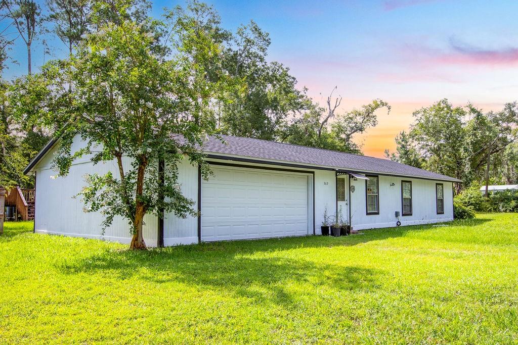 This is a 3 bedroom, 2 bathroom home on just over an acre in Lake City, Florida that has been fully remodeled inside and out and is ready to move into. The property sits on a paved road, is fully fenced, and has a gated entrance. The roof is 4 years old. The home runs on well and septic. Inside, the home has been updated throughout. The master bedroom is a good size and has its own private full bathroom. The other two bedrooms share the second full bathroom and work well for kids, guests, or a home office. The 1.024 acres is fully fenced which is great for kids, dogs, or anyone who wants defined boundaries around their property. The gated entrance adds privacy and security. The paved road means easy access year round without dealing with dirt or gravel. Location is one of the strongest parts of this property. You are only 6 minutes from Lake City where you have Walmart, Publix, Lowe's, Home Depot, Lake City Medical Center, and a full range of restaurants and everyday services. Live Oak is 28 minutes away. Gainesville is about an hour down the road with UF Health Shands and everything a major city offers. No HOA. Fenced and gated. Remodeled. Paved road. Over an acre. 6 minutes from town. This one is ready to go.