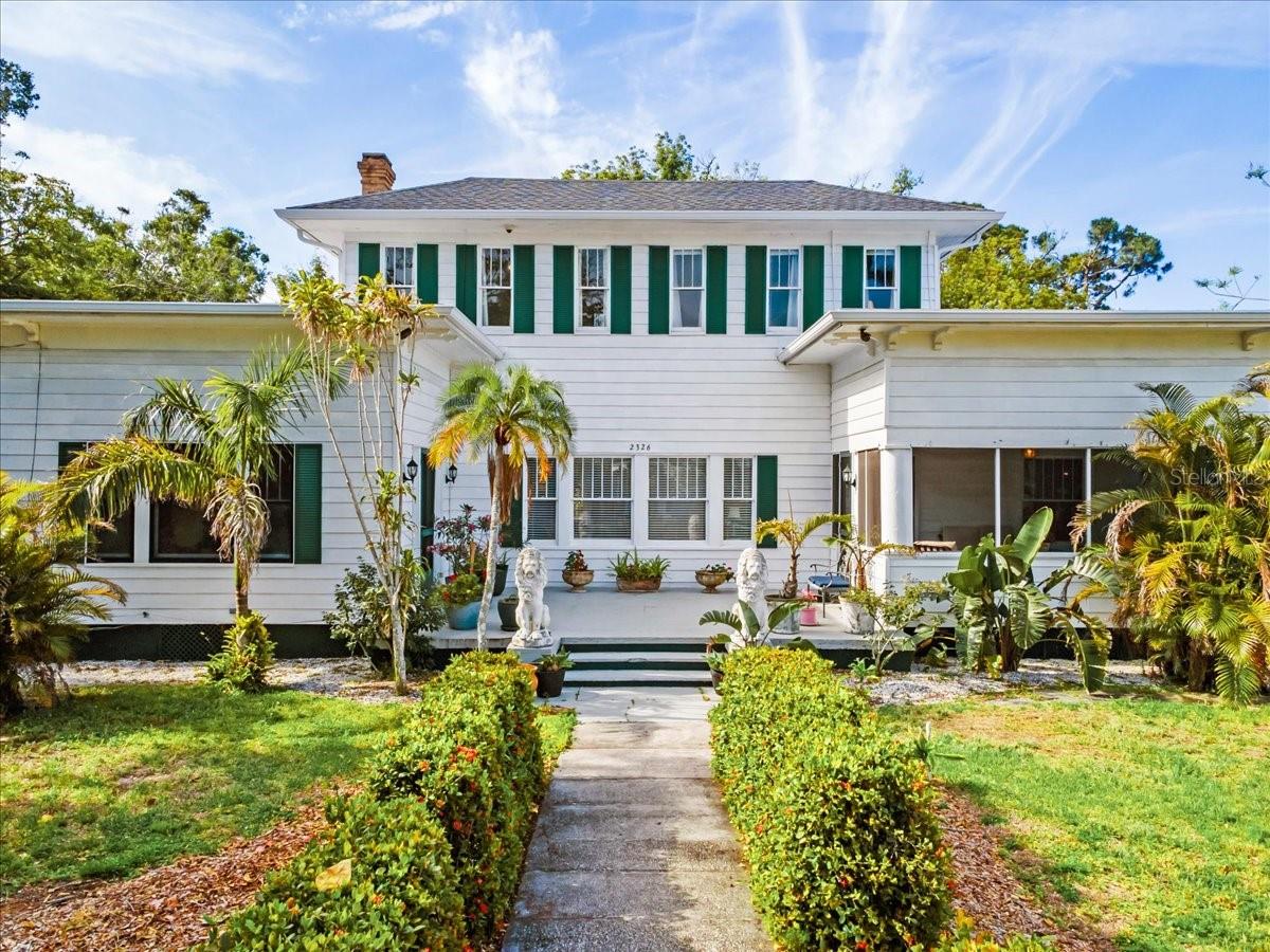 ONCE IN A LIFETIME ESTATE!  Live the Old Florida dream with this spectacular 1928 home built by one of Bradenton's first doctors.  The Lancaster home features original heart pine flooring, art deco light fixtures, hand painted murals and loads of history.  The home boast 3364 sf with 3 bedrooms, 3 full baths, a beautifully designed office area and a dream sunroom with new pool and pool cage.  The exterior of the home has a total of 1.28 acres and has the potential for further development with two approved building lots on the property.  With the land you could construct an RV Garage, boat garage, or place two additional homes for a family compound, bed n breakfast, or short term rental property.  To describe the possibilities of this property here would be an injustice.  The home was fully restored and renovated from 2020-2024.  All systems are updated so all you have to do is move in.  Most furnishings are included with the sale.  This home is truly a must see, a one of kind property.