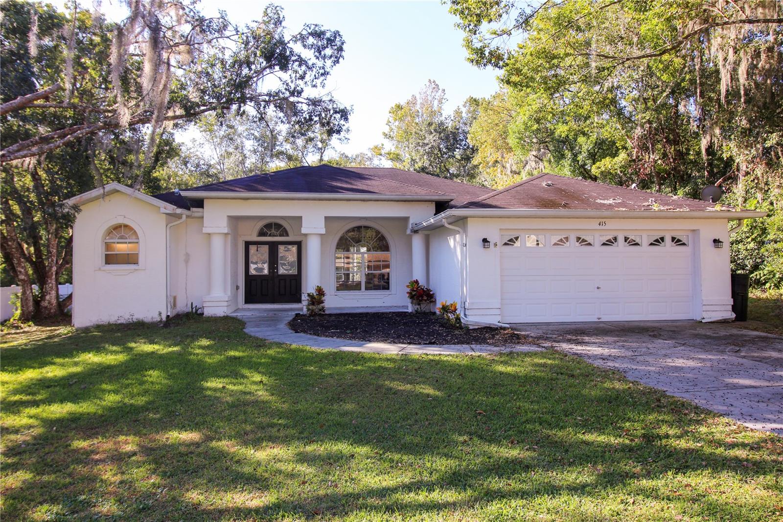 This 2006 built 3 bedroom, 2 bath pool home features a wonderful open floor plan with lots of light. Entering the grand double front doors you find a large living area with kitchen, living room and formal dining room. The kitchen has a large island with a kitchen sink and breakfast bar style seating. The light Corian countertops matched with the classic cabinets and updated stainless steel appliances gives the kitchen a very modern and open feel. Just beyond the kitchen is a breakfast nook with 3 large windows overlooking the pool and backyard. Nestled into the back of the house is a large family room with vaulted ceiling, lots of windows and sliding glass doors that open to the pool deck, perfect for entertaining or relaxing. Across the house you will find the large master bedroom, featuring its own sliding glass doors to the pool deck, double walk-in closets and full bathroom suite. Master bath suite has double sinks, a walk-in shower, and a large jetted tub for relaxing after a long day. Bedrooms 2 and 3 are located on the opposite end of the house. Bedroom 2 features a walk-in closet. The hall bathroom is conveniently located just off the kitchen. As you exit the back of the house through any of the 3 sliding glass doors you enter the fully screened pool deck with a south facing covered patio providing shade all day. Just outside the pool deck is a paver patio perfect for grilling or sitting around a fire pit. In the back corner of the yard is a storage shed just right for storing mowers and lawn equipment. Yard is over 1/3 of an acre and features many mature trees. Don’t miss out on this rare deal on a pool home!

*Seller is listing the house $30,000 below market value.  House could use some fresh paint and minor TLC. Offering great upfront equity to its new owner. A new roof and air conditioning system will be installed prior to closing.