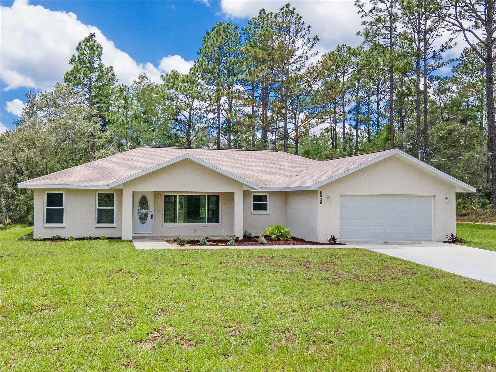 Looking for a brand new home in a quiet location? Then you have found it! Located in beautiful Citrus Springs, this home wont disappoint. Sitting high and dry on a .33 acre lot , fully sodded, this home is ready! Luxury Vinyl Tile throughout, Granite tops, Shaker Cabinets, stainless appliances , tiled showers, and split bedrooms.