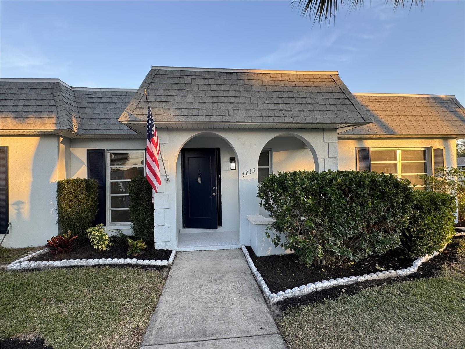 Very respectable price reduction on this totally updated West Bradenton ground level condo.  Don't miss out on one of West Bradenton’s best kept secrets.  Darling association with all ground level condos, so no stairs with groceries, luggage or golf clubs!  And best of all no one above you.  This condo has had a complete renovation with entire new kitchen including appliances, both bathrooms, floors, doors and jambs, baseboards, most windows replaced with impact (to the tune of $13,000!), all light and plumbing fixtures, paint.  The kitchen has white cottage style cabinets, stainless appliances, solid surface counters with complimenting backsplash, undermount sink, French door fridge, smoothtop range, microwave range hood, and separate island/bar with spacious pan drawers.  The bathrooms have new fixtures, elongated bowls, tile bath and shower walls, white cottage vanities and glass subway accents. There is a laundry room accessed from the inside with a full size washer and dryer and storage shelf.  The back yard is accessed via sliding glass doors to a window enclosed lanai and rear door that opens to a beautiful royal poinciana tree.  There is parking right at the front entry of this single level corner villa with extra windows to enjoy our Florida sunshine.  This home is about a half block to the clubhouse and pool where you will find many activities if you choose to enjoy your fellow Cortez Villas neighbors for socializing.  5 to 20 minutes from everything Manatee County has to offer including our wonderful white sandy beaches, golfing, boating, groceries, retail shopping, medical facilities, houses of worship, live and on screen theaters, museums, tons of sport venues, shop till you drop at UTC Mall and famous St Armands Circle, Downtown Bradenton’s River Walk, and last but not least, Sarasota Bradenton International Airport.  Even tiny little Fido is welcome. Sorry no trucks permitted