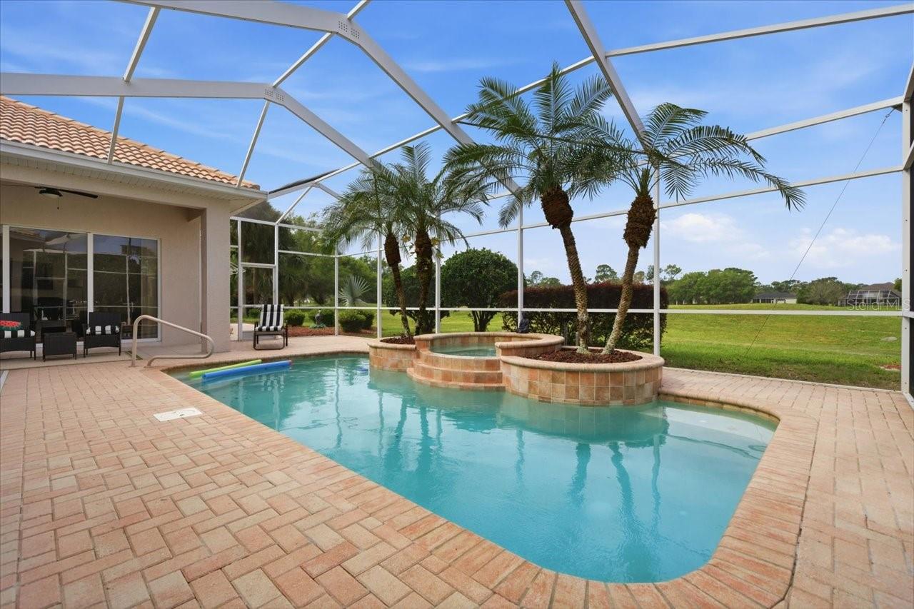 If you’ve been looking for a GOLF COURSE HOME, this one right here is worth a look. Sitting right on the 18TH HOLE in Silverthorn, this 5 BEDROOM, 4 BATH home gives you BEAUTIFUL SUNSET VIEWS straight over your PRIVATE HEATED POOL & SPA, about as peaceful as it gets.

Pulling up, you’ll notice the TWO OVERSIZED SIDE-FACING GARAGES and the big PAVER DRIVEWAY with plenty of room for parking when friends and family come by. Inside, you’ve got TILE and REAL WOOD FLOORS and a standout STONE, GAS, DOUBLE-SIDED FIREPLACE that really makes the living space feel like home.

The layout is a true SPLIT FLOOR PLAN, with the PRIMARY SUITE tucked away on one side featuring TWO WALK-IN CLOSETS, a WALK-IN SHOWER, GARDEN TUB, and DOUBLE VANITY. On the other side, the guest rooms have NEW CARPET, CLOSET ORGANIZERS, and a setup that works great for family or visitors with both shared and private bathrooms.

The kitchen gives you plenty of CABINET SPACE and COUNTERTOP ROOM, plus an ISLAND that makes it easy for everyday living or having people over. Out back, the SLIDING GLASS DOORS open up to a SCREENED PAVER PATIO where you can kick back by the pool and spa. The pool heater is able to keep the waters warm, even in the cooler months. 

Homes like this on the 18TH HOLE in Silverthorn don’t come around too often especially one this unique.