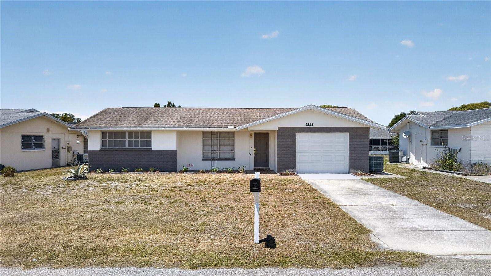 Unique opportunity in Port Richey! Fully renovated and move-in ready. Discover this stunning 2-bedroom, 2-bathroom home featuring a modern open-concept layout that seamlessly connects the kitchen, living room, and dining area—creating a spacious and inviting atmosphere perfect for everyday living and entertaining. The property has been completely updated with high-quality finishes, including a luxury kitchen and modern bathrooms, offering the style and comfort today’s buyers are looking for. Located in a quiet and convenient area, close to schools, shopping  centers, hospitals, and restaurants, this home delivers the perfect combination of location, comfort, and value. Move-in ready. Bright and open spaces. Spacious garage. Ideal as a primary residence or investment property. This one won’t last. Schedule your showing today.