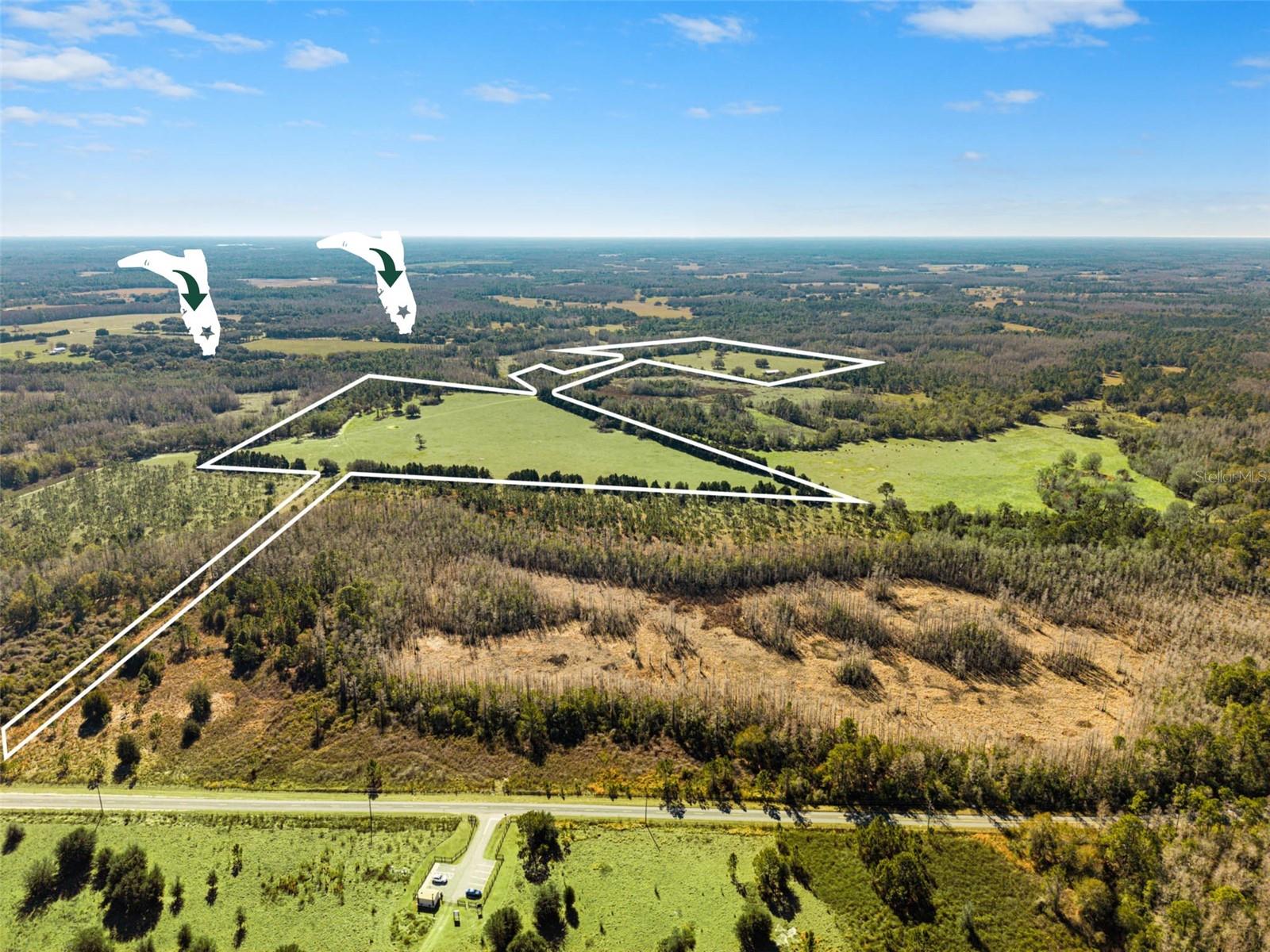 An extraordinary and increasingly rare offering in the State of Florida — ±147 acres of legacy land defined by privacy, scale, and natural permanence. This assemblage presents a configuration seldom encountered: multiple parcels entirely enveloped by conservation and government-owned lands, creating a protective buffer that ensures enduring seclusion and an unmatched sense of control over one’s surroundings. Expansive, improved pastures sit high and dry, framed by native landscapes that reflect Old Florida at its finest.

Towering oak hammocks shelter abundant wildlife including whitetail deer, Osceola turkey, and a diverse array of native species, while a distinct section of the property preserves planted witness trees dating back to the early 1800s — a living testament to Florida’s earliest surveying history and a feature virtually impossible to replicate. Of the seven parcels, three carry approved building opportunities, allowing a future owner to thoughtfully steward the land while establishing a private compound, equestrian estate, or multi-generational retreat without compromising the integrity of the landscape.

An additional dimension of value exists through ±77 acres connected via deeded easements approximately two miles away, paired with a separate ±70-acre tract offering strategic flexibility for a discerning buyer. Whether envisioned as a premier recreational facility, a private hunting preserve, or a secondary enclave dedicated to the heritage lifestyle of rural Florida, these opportunities provide scale and optionality rarely found within a single acquisition strategy.

Currently utilized for agricultural purposes, the owner operates a cow-calf program supported by leased surrounding lands, underscoring the property’s functional productivity as well as its investment credibility. This is not merely acreage — it is Florida as it once was and increasingly will never be again. A generational holding for those who value privacy over proximity, permanence over convenience, and stewardship over spectacle. An opportunity to secure, preserve, and cherish a vanishing way of life.