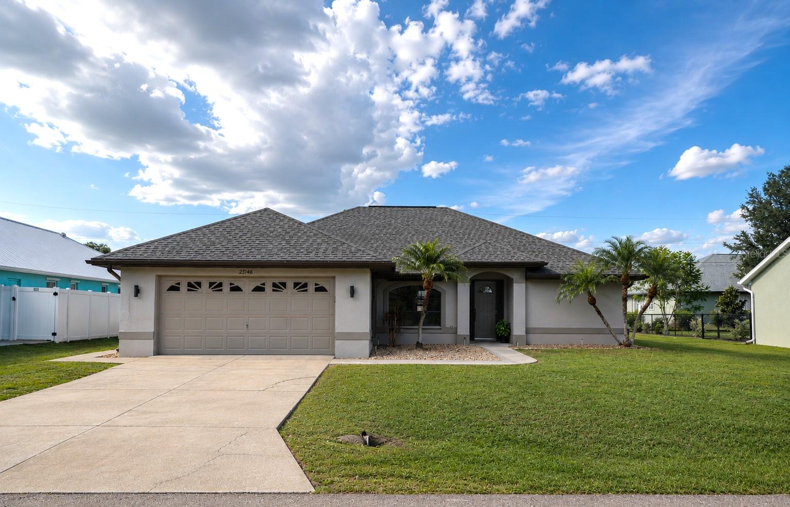 Beautiful 3 Bedroom, 2 Bath Home in Highly Desirable Section 15 of Port Charlotte! This light and bright home features brand-new tile flooring throughout, a formal dining area and a spacious kitchen with breakfast bar, pantry, abundant cabinet space, and a cozy breakfast nook overlooking the backyard. The primary suite offers a walk-in closet, dual vanities, walk-in shower, and sliding doors to the screened lanai. The versatile third bedroom can also be used as a home office, den, or flex space. The spacious indoor laundry room includes a washer, dryer, utility sink, built-in cabinetry, and additional storage. Enjoy the screened lanai, large backyard, detached concrete block storage shed with roll-up door and a two-car garage. Located in the well-maintained Section 15, with convenient access to I-75, shopping, dining, medical facilities, and all that Port Charlotte, North Port, Venice, and Punta Gorda have to offer. Available now!