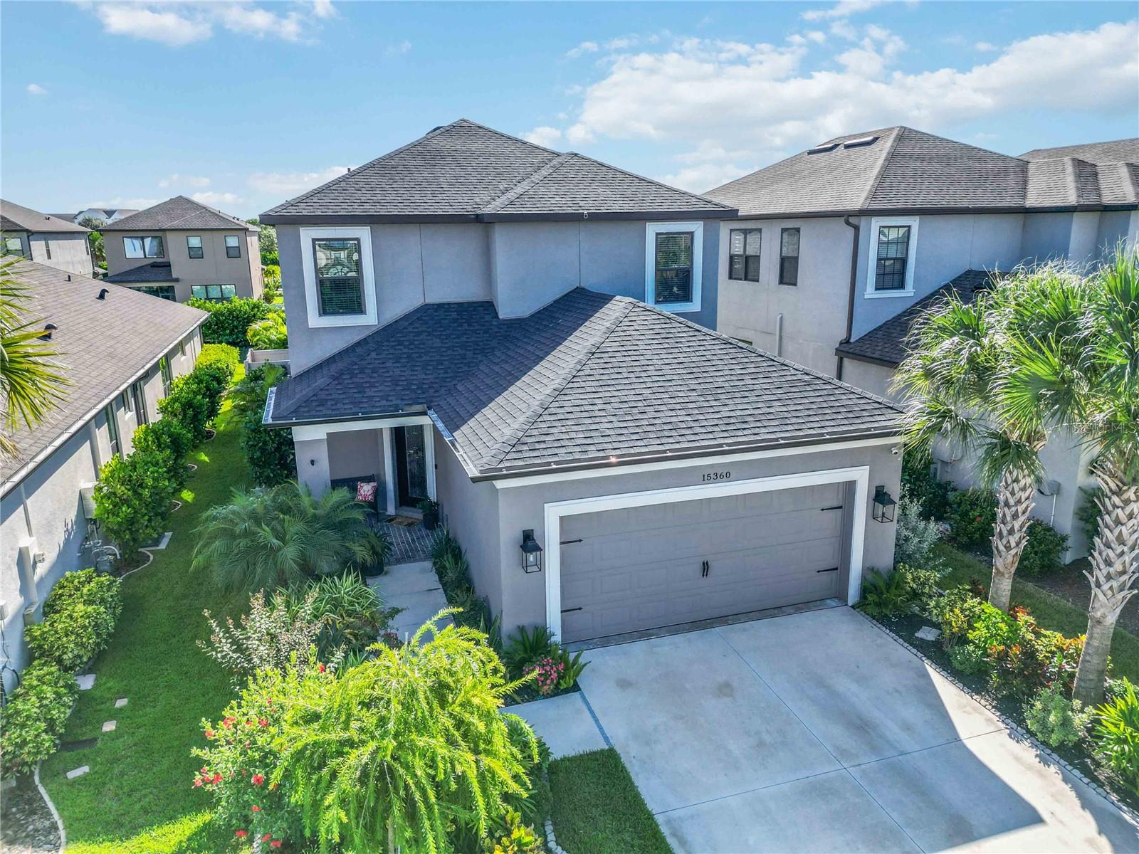 Welcome to 15360 Isla Palma Lane, a beautifully upgraded Anastasia model located in the highly desirable Palmero community in Nokomis. This light-filled, coastal-inspired home offers an exceptional layout, upscale finishes, and a private outdoor retreat — ideal for those seeking comfort, style, and convenience.
The open-concept main living area is bright and inviting, featuring plank-style flooring and views of the private heated pool and spa. The designer kitchen is equipped with 42” soft-close cabinetry, granite countertops, tile backsplash, and stainless-steel appliances, including a Samsung gas cooktop and French-door refrigerator — perfect for everyday living and entertaining.
The first-floor primary suite provides peaceful pool views and a spa-like bathroom with dual vanities and a walk-in shower. A flexible room with French doors on the main level works beautifully as a home office, study, or den. Upstairs, you’ll find three additional bedrooms and a spacious loft, including a private guest suite with its own full bath, offering excellent separation and versatility for family or visitors.
Outside, enjoy a covered lanai, lush tropical landscaping, and your own heated pool and spa, creating a true private oasis. The home has been meticulously maintained and shows like a model.
Residents of Palmero enjoy resort-style amenities, including a community pool and spa, sports courts, fire pit, and dog park — all just minutes from Nokomis Beach, Siesta Key, Sarasota Memorial Hospital, top-rated schools, and miles of outdoor recreation.
Lease Details: Available for annual lease with some flexible terms available. Offered unfurnished. Pool and lawn care included. Pets allowed with some restrictions. Available March 1st.