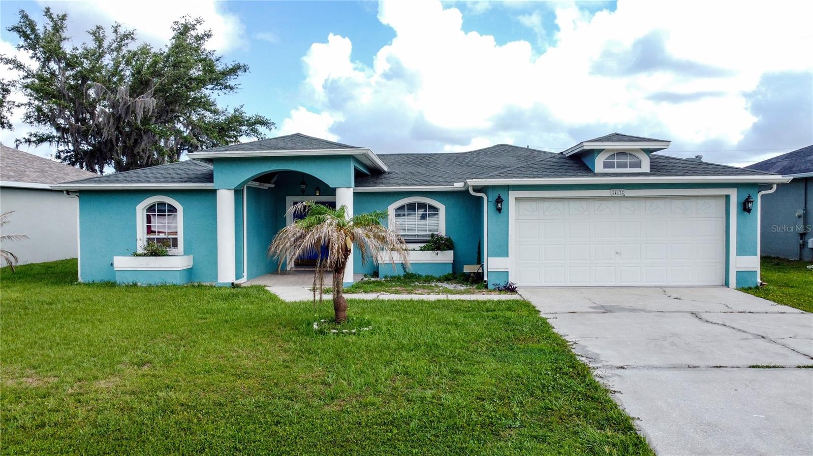 Welcome home to this spacious 4-bedroom, 2-bath residence offering the perfect blend of comfort, convenience, and Florida lifestyle living! From the inviting covered entryway to the open-concept floor plan, this home is designed for both everyday living and effortless entertaining. The thoughtful layout features generous living spaces, a desirable split-bedroom design, and a 2-car garage. The kitchen features solid-surface countertops and includes all kitchen appliances, providing added value and convenience for the next owner. Ceramic tile flooring extends throughout the main living areas, while the bedrooms feature laminate flooring for added comfort and warmth. Ceiling fans throughout the home enhance comfort and energy efficiency year-round. With recent interior paint, a roof installed in 2016, and an A/C system replaced in 2019, this home offers a solid foundation for buyers looking to add their own personal touches. The spacious open floor plan, four-bedroom layout, and desirable location within the growing Poinciana community create an excellent opportunity to build equity while enjoying all the area's amenities. Ideally situated just minutes from schools, shopping, dining, and everyday conveniences, you'll also enjoy access to the incredible amenities that make Poinciana one of Central Florida's fastest-growing communities. Residents have access to multiple parks, fitness centers, community pools, sports courts and fields, scenic walking trails, dog parks, and even an Olympic-size pool. The community is also home to a regional hospital and a Valencia College campus, providing exceptional convenience for residents. With easy access to major highways, employment centers, and Central Florida's world-famous attractions, this location offers the perfect balance of accessibility and lifestyle. Whether you're a first-time homebuyer, growing household, or investor seeking value in an expanding market, this property presents a fantastic opportunity. Schedule your private tour today and discover the potential of this Florida home!