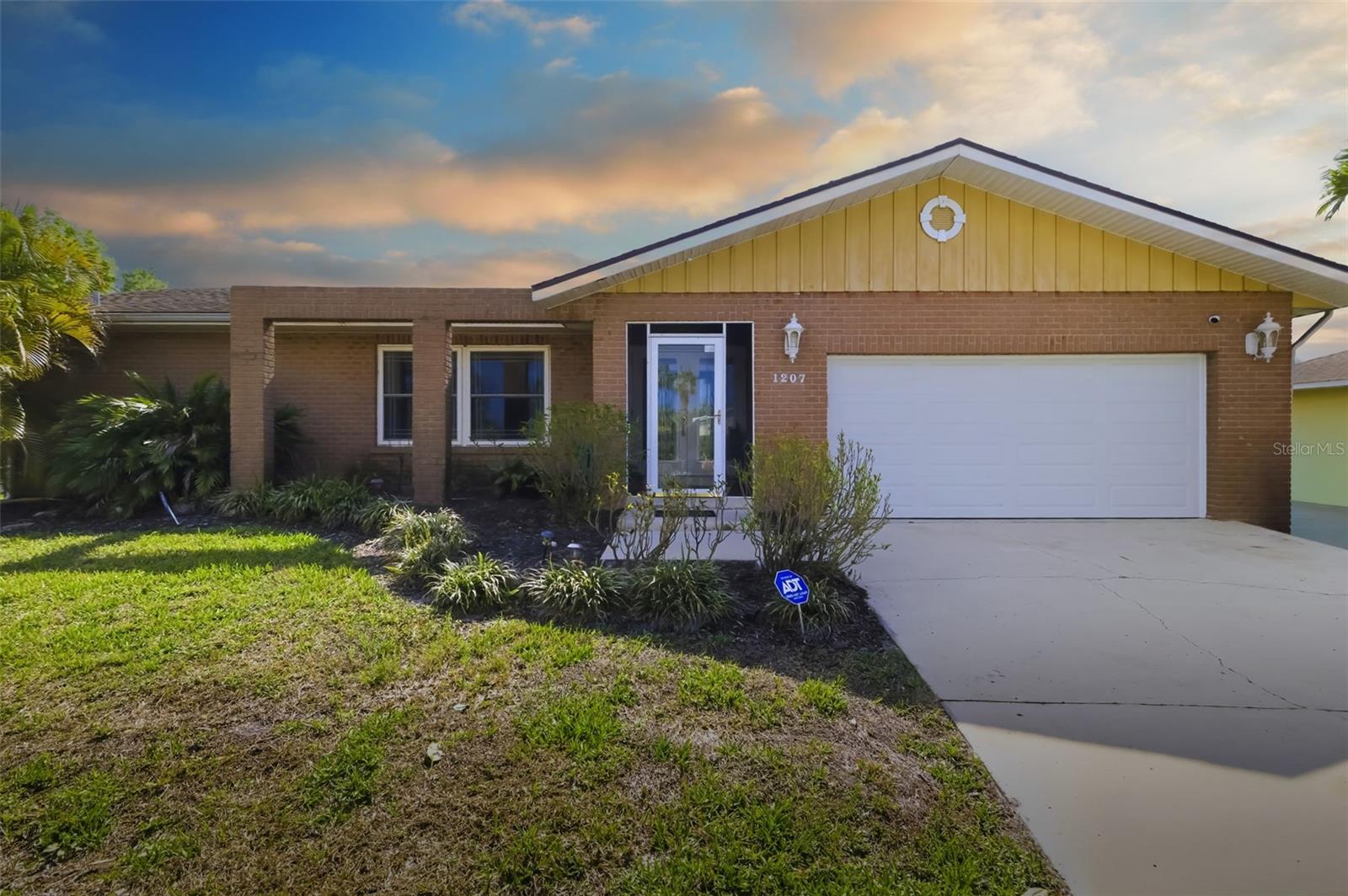 Welcome to your own private tropical retreat in Northwest Bradenton. This 3-bedroom, 2-bath pool home offers a relaxed Florida lifestyle with peaceful pond views and inviting indoor-outdoor living spaces. From the moment you arrive, lush tropical landscaping and a welcoming presence set the tone. Inside, the home features an updated kitchen with granite countertops and high-grade cabinetry, providing a functional and stylish gathering space for everyday living and entertaining. Expansive newer windows and doors (2020) allow natural light to fill the home while framing serene views of the pool and water beyond. Step outside to an oversized screened porch overlooking the resort-style pool and tranquil pond, creating the perfect setting for morning coffee, afternoon swims, or quiet evenings enjoying nature. The paver pool deck and private dock enhance the feeling of having your own backyard getaway. Important updates include HVAC replacement in 2022 and roof in 2011, offering added peace of mind. While the home has been thoughtfully improved, there remains opportunity for a new owner to add personal touches and further enhance the space. Ideally located just minutes from Robinson Preserve and De Soto National Memorial, and a short drive to Gulf beaches, local restaurants, shopping, and highly regarded schools, this property combines lifestyle, location, and potential in one appealing package.