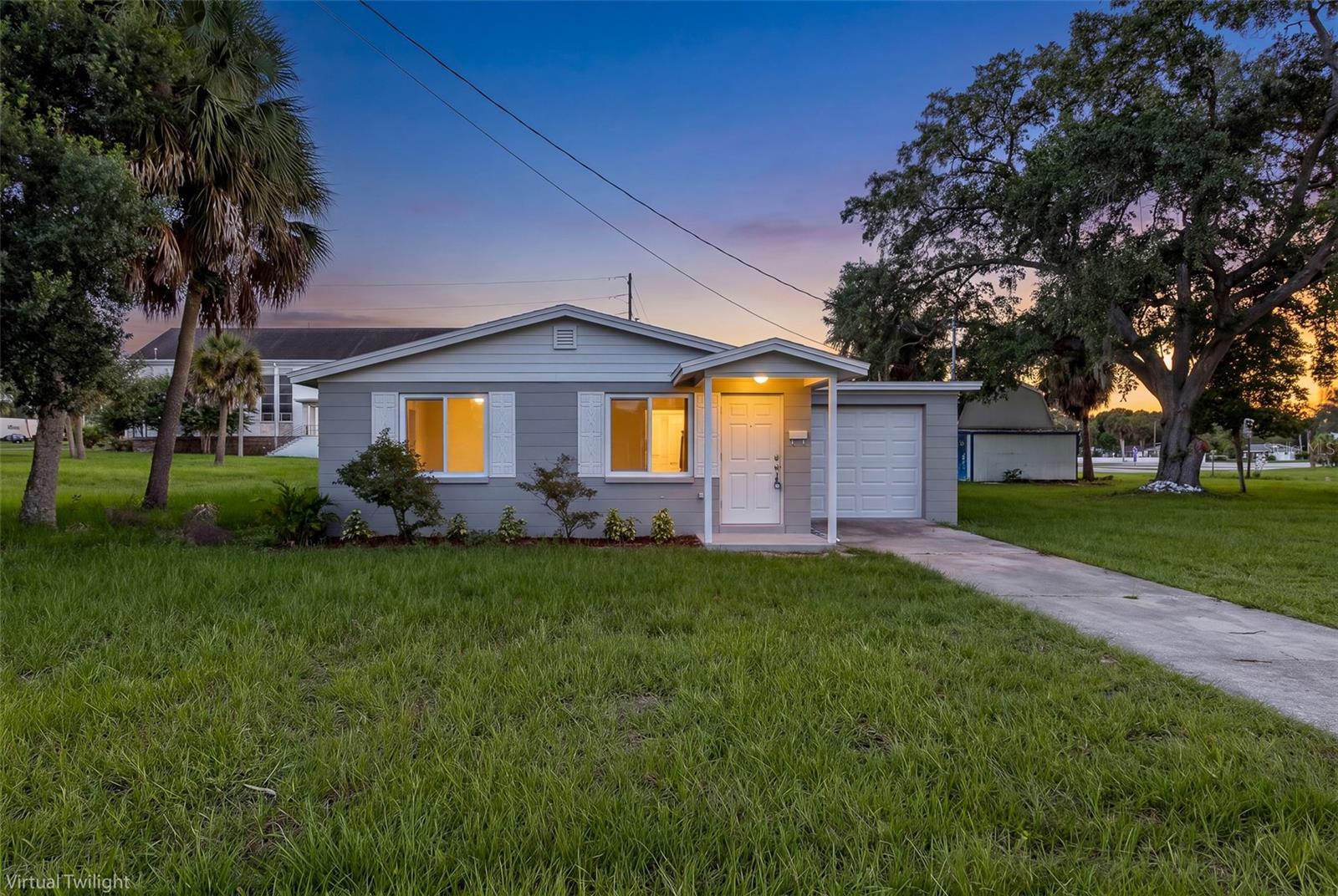 Welcome home to this beautifully REMODELED!! 3-bedroom, 2-bathroom home in the heart of Downtown New Port Richey! STEPS AWAY FROM FROM MAIN STREET AND AMAZING SHOPS, RESTAURANTS AND SO MUCH MORE! Renovated from top to bottom BRAND NEW ROOF AND IMPACT WINDOWS!! NO HOA. GREAT VACATION HOME, RENTAL/AIRBNB. This move-in-ready home features a stylish new kitchen with updated cabinetry, countertops, stainless steel appliances, new flooring throughout, fresh paint, updated lighting, and beautifully remodeled bathrooms. BRAND NEW ROOF AND IMPACT WINDOWS! The desirable split-bedroom floor plan offers added privacy, with the spacious primary suite separated from the two guest bedrooms. The primary bedroom also features a private exterior entrance, making it ideal for guests, a home office, or a private retreat. Conveniently located just minutes from the public boat ramp and the Gulf of Mexico, you'll also enjoy easy walk or golf cart ride to Downtown New Port Richey's restaurants, breweries, shops, parks, and year-round entertainment. Whether you're looking for a primary residence, vacation home, or investment property, this fully renovated home is one you won't want to miss! STORAGE SHED.