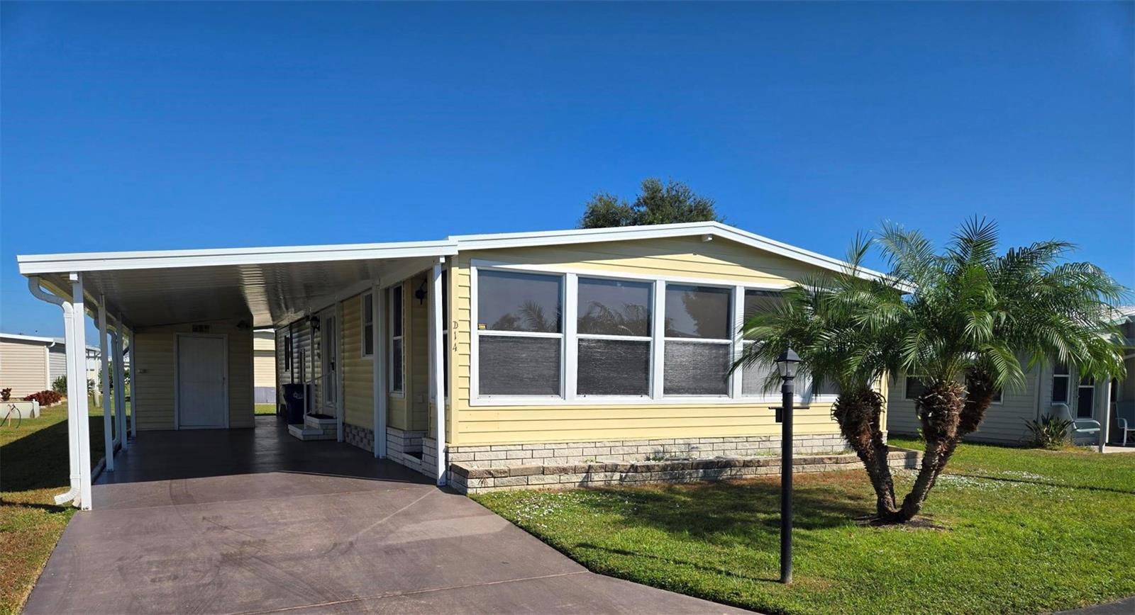 Move right into your Fabulous New Home soon! Your new home has been immaculately maintained with many newer major improvements! This home has a replaced Carport in 2025 that could fits vehicles, along with more space for possibly a third vehicle uncovered. Enjoy the spacious Florida Room across the front of the Home. The Kitchen has a quality Stainless Steel newer Refrigerator and a nice eating area to relax in. The large Master Bedroom has a spacious Walk-In Closet, a separate Sink and Vanity area, along with the walk-in shower and commode. In 2023, a new Water Heater was installed, A/C, Dehumidifier, and Surge Protector along with all new flooring throughout, including the Florida Room. It was all freshly painted and a newly remodeled second bathroom was done. Your new Stylish Home will come fully furnished which you will LOVE!  You can never tire in Westwinds with all of the Activities offered with the Huge Heated Pool, Clubhouse, Shuffleboard, Pancake Breakfasts, Card Groups of many sorts, Exercise, Travel Groups, Bible Study, Parties and Dinners for most Holidays. This is a great place to meet your Neighbors while walking or riding your bikes. The Maintenance Fee includes: Cable, Internet, Lawn mowing, Trash, Water, Sewer, and Well Water for lawn sprinkling. Don't pass up this Beautiful Home and Community!