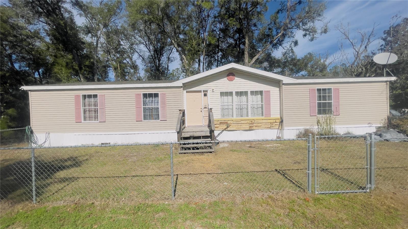 Charming 3 bedroom, 2 bath property located within the city limits and sitting on a spacious 0.32 acre corner lot. This home features an open floor plan designed for comfortable everyday living and easy entertaining. The inviting fireplace adds warmth and character to the main living area, while the spacious kitchen offers plenty of room to cook, gather, and create memories. A large laundry room provides extra storage and functionality, and the convenient location near local schools makes this home especially appealing. Chain linked fence to provide added safety. With no HOA, you’ll enjoy the freedom to truly make this property your own. Don’t miss this opportunity. Call today to schedule your private showing and see all this home has to offer.
