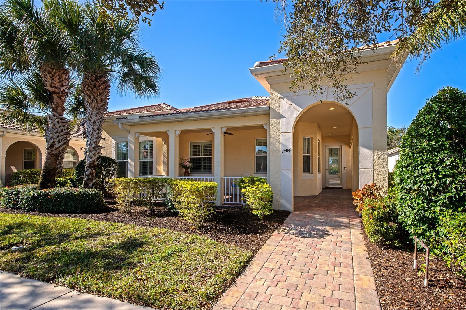 BIG PRICE IMPROVEMENT! Palmer Ranch | Private Pool | Screened Lanai | Updated HVAC | Light moves easily through the main living spaces of this well maintained residence in the Isles of Sarasota. The living and dining areas open directly to the screened lanai and private pool, creating a natural connection between indoor comfort and outdoor living. Ten foot ceilings, crown molding, and ceramic tile flooring give the interior a clean and open feel without unnecessary ornamentation. The kitchen offers breakfast bar seating and an adjoining dining nook, positioned to remain connected to the main living areas while maintaining its own defined space. The split bedroom layout provides separation for guests, while the primary suite includes a walk in closet and en suite bath designed for everyday ease. A complete HVAC replacement in 2021 supports quiet performance, consistent comfort, and exceptional humidity control. Impact glass at the front entry and lanai door, remote-controlled hurricane screens, and recent interior paint add to the sense of care and readiness throughout the home.  Within the Isles of Sarasota, daily life unfolds in a well maintained neighborhood setting with mature landscaping and an active clubhouse. Residents gather at the pool, meet for tennis or pickleball, or enjoy the ease of living in a community that is carefully kept and thoughtfully managed. Set within Palmer Ranch, the location offers convenient access to shopping, dining, the Legacy Trail, and Gulf Coast beaches, balancing neighborhood privacy with everyday accessibility. A home designed for comfort, connection, and ease within one of Palmer Ranch’s most established communities.