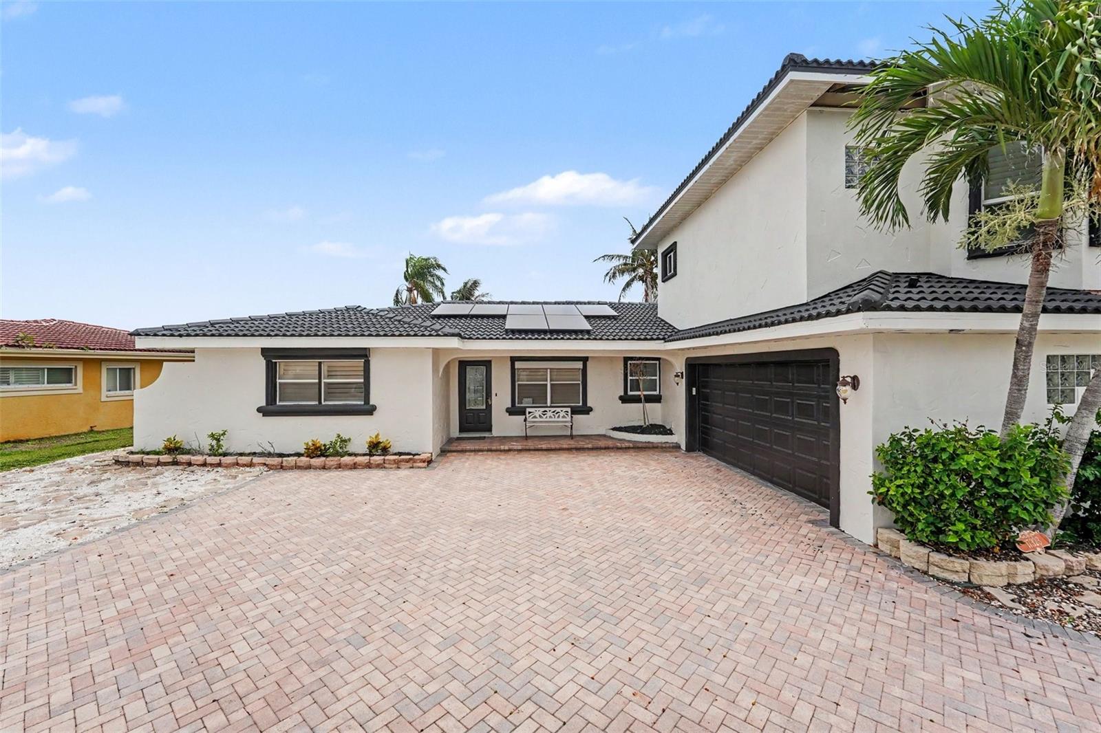 ** Finishing Rehab Opportunity - Sold "AS IS" **
Experience the ultimate Florida waterfront lifestyle at 17323 Kennedy Drive, where breathtaking open Intracoastal Waterway views, spectacular sunrises, and direct boating access create a truly exceptional coastal retreat. Nestled on a quiet cul-de-sac in desirable North Redington Beach, this beautifully updated residence offers approximately 2,729 square feet of living space with 5 bedrooms, 3 bathrooms, multiple flexible living areas, and a private dock with boat lift.

Designed to maximize its stunning waterfront setting, the home features an open-concept floor plan with expansive windows showcasing panoramic water views from the main living areas, kitchen, and primary suites. Two spacious primary bedrooms—one on each level—provide exceptional flexibility for multigenerational living or guest accommodations. Outdoor amenities include a heated pool, expansive patio, mature tropical landscaping, and a private dock where dolphins, manatees, and native birds are frequent visitors.

Just a short walk to the Gulf beaches, this property combines the tranquility of waterfront living with convenient access to local dining, shopping, and world-class beaches. Whether enjoying a morning paddleboard excursion, relaxing poolside, or heading out for a day on the water, this home delivers the quintessential North Redington Beach lifestyle.

Property Highlights

Waterfront location with expansive Intracoastal Waterway views
5 bedrooms, 3 bathrooms
Approximately 2,729 SF living area
Private dock and boat lift
Heated swimming pool
Two primary suites
Open-concept living spaces with panoramic water views
Two-car garage plus additional parking
Short walk to Gulf beaches
Located in the Sunray Beach Homes subdivision in North Redington Beach