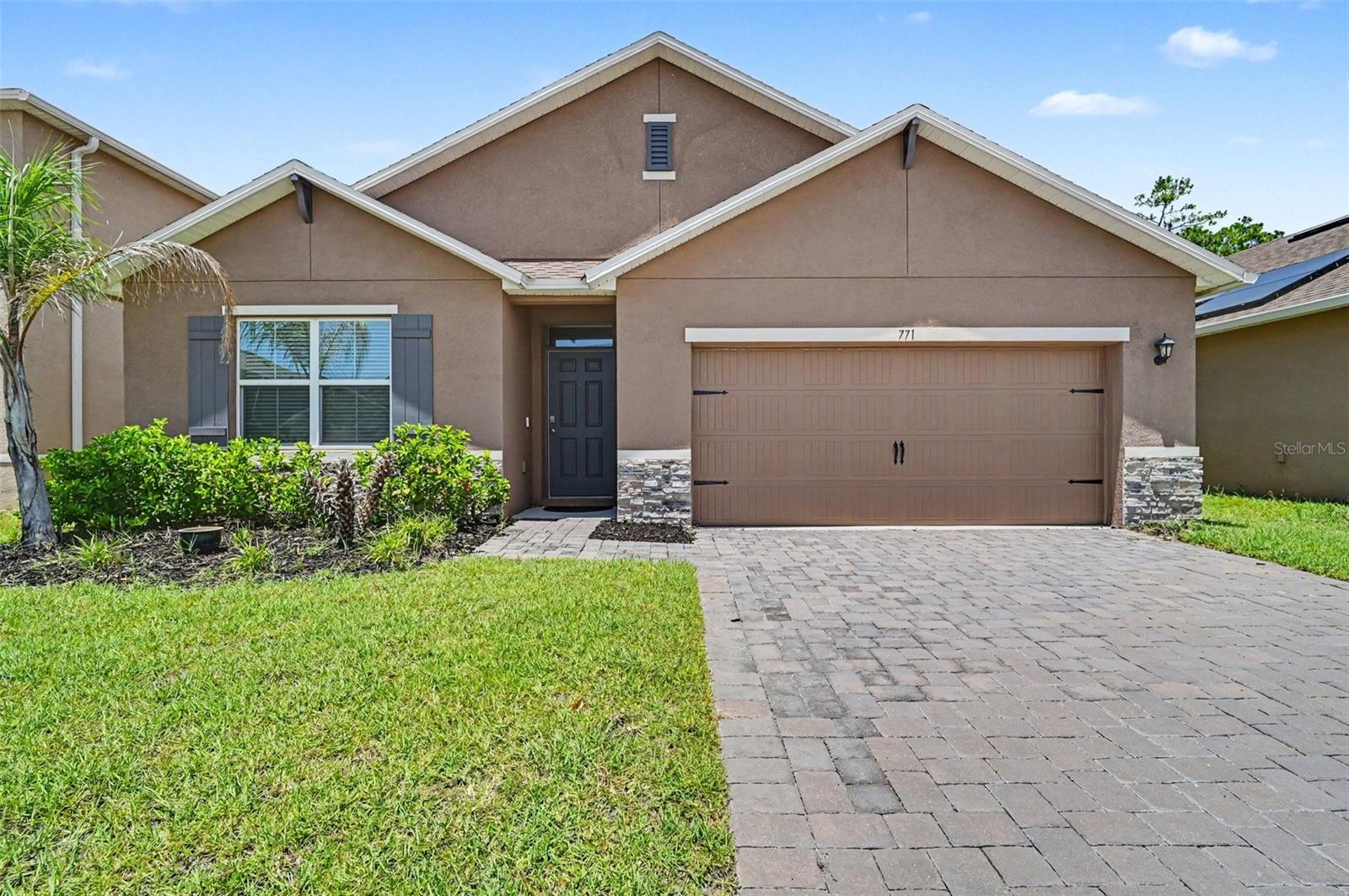 Now available for immediate occupancy! Located in the gated, waterfront community of Riviera Bella, this DeBary 4-bedroom, 2-bath home offers 1,836 square feet of living area with a desirable split-bedroom floor plan, 2-car garage, and covered lanai for relaxing or entertaining. The well-equipped kitchen has all appliances and granite countertops, inside laundry room includes washer and dryer. Lawn care is included, allowing you to enjoy maintenance-free living. Residents also enjoy outstanding amenities including a resort-style swimming pool, fitness center, clubhouse, splash pad, playground, picnic area, and private boat ramp with access to the St. Johns River. The nearby Highbanks Marina is just minutes away for boating, fishing, and waterfront dining. Renter's insurance is required. Possible lease-purchase terms are available for qualified applicants. Sorry, no pets. Schedule your private showing today!