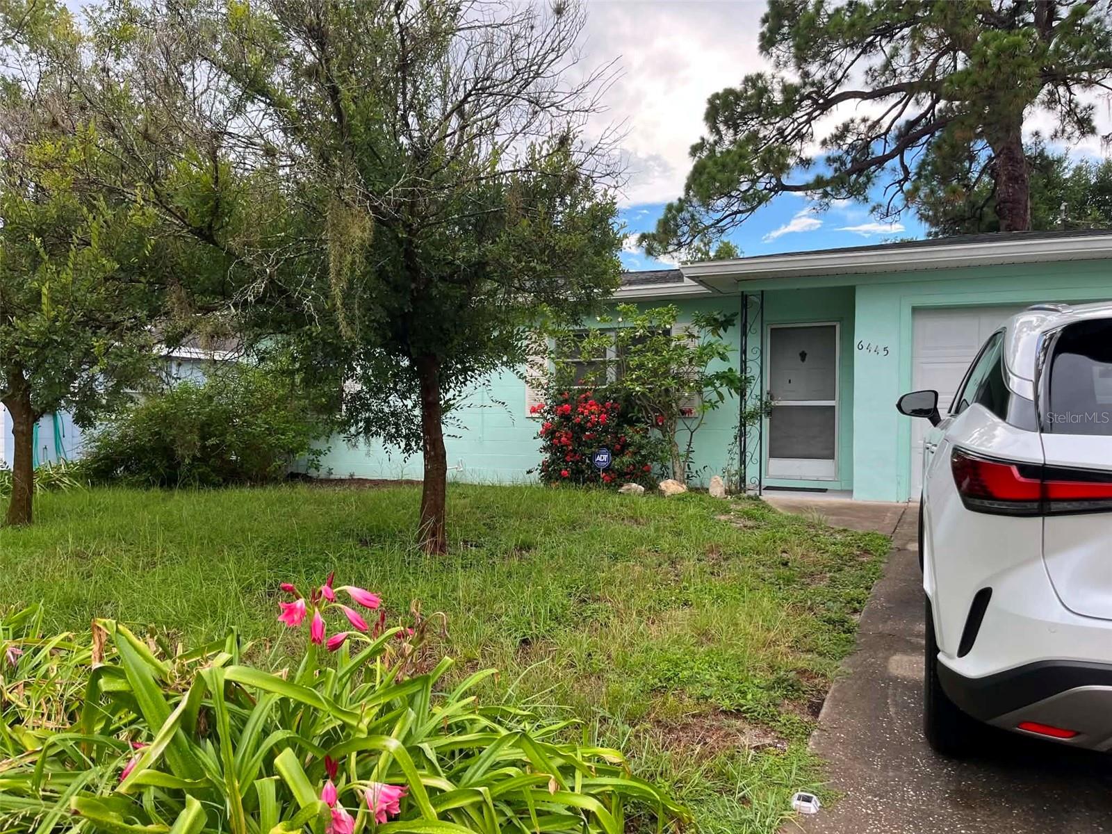Locate, location, location!!!
Welcome to 6445 River Rd in New Port Richey, FL, this charming 2bedroom/1 bath home is a wonderful opportunity for homeownership. Literally steps away from Sims Park, the city boat dock/launch and downtown NPR, this property boasts a location that provides both convenience and a sense of community.  New Port Richey is a golf cart-friendly city, with several shops and restaurants on and around  Main Street. Sims Park is a popular local spot where there are bands/shows/movies  and a beautiful playground with a splash pad. This home is ideally positioned to enjoy the nearby amenities of the charming downtown area, which makes this property a great choice for those seeking a vibrant yet relaxed lifestyle. 
High and dry, this home did not flood during the "One hundred year storm" of 2025. Large corner lot, solid concrete block construction, new roof in 2020, new HVAC system in 2014. Inside freshly painted in summer 2026. Retro terrazzo floors (island vibe)could be polished or you can get whatever flooring would suit your style. 
Ready for immediate closing and occupancy.

Discover the local happenings in New Port Richey. Enjoy recurring outdoor block parties, live music events, and community wellness gatherings hosted downtown and at the Recreation and Aquatic Center.