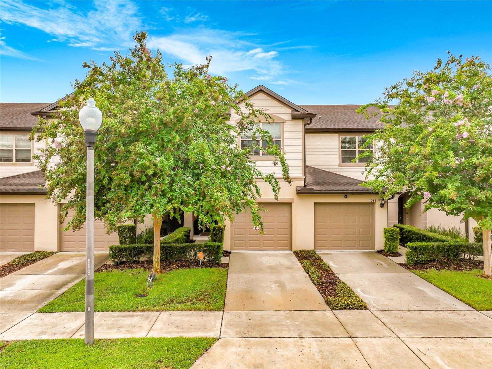 ***Seller is offering $6,000 toward the buyer’s closing costs or an interest-rate buydown!  Additional $$$ buyer costs assistance available through preferred lender.***.   Located in the GATED COMMUNITY of Emerson Crossing.  This beautifully updated, move-in-ready townhome offers 3 bedrooms, 2.5 bathrooms, with stylish custom features throughout.  
The open-concept main level features tile flooring and flows seamlessly from the kitchen into the dining and living areas. The kitchen is beautifully appointed with granite countertops, stainless steel appliances, rich espresso cabinetry, and upgraded touches. In the living room, an added fireplace with a striking white brick feature wall creates a warm and inviting focal point. Black interior doors and upgraded lighting add a sophisticated designer touch throughout the home.
The living area extends to the lanai, providing additional space for relaxing. Upstairs, the spacious primary suite features new luxury vinyl plank flooring, a custom-designed walk-in closet, and an ensuite bathroom with dual vanities. Two additional bedrooms, a full bathroom, and a conveniently located laundry area with a NEW WASHER AND DRYER complete the second floor.  This single owner - well maintained home is move in ready! 
Located in Emerson Crossing, a gated community featuring a community pool, children's playground, low HOA fees, and no CDD, this home combines comfort, convenience, and value. A new Publix-anchored shopping center is within walking distance, and AdventHealth Apopka is also nearby. Enjoy easy access to State Roads 414 and 429, approximately 13 minutes to the RDV Sportsplex in Maitland, 20 minutes to Downtown Orlando, and 30 minutes to Central Florida’s attractions.
Situated in a growing and up-and-coming area, this thoughtfully upgraded home shows beautifully and is ready for its next owner. Schedule your private showing today!