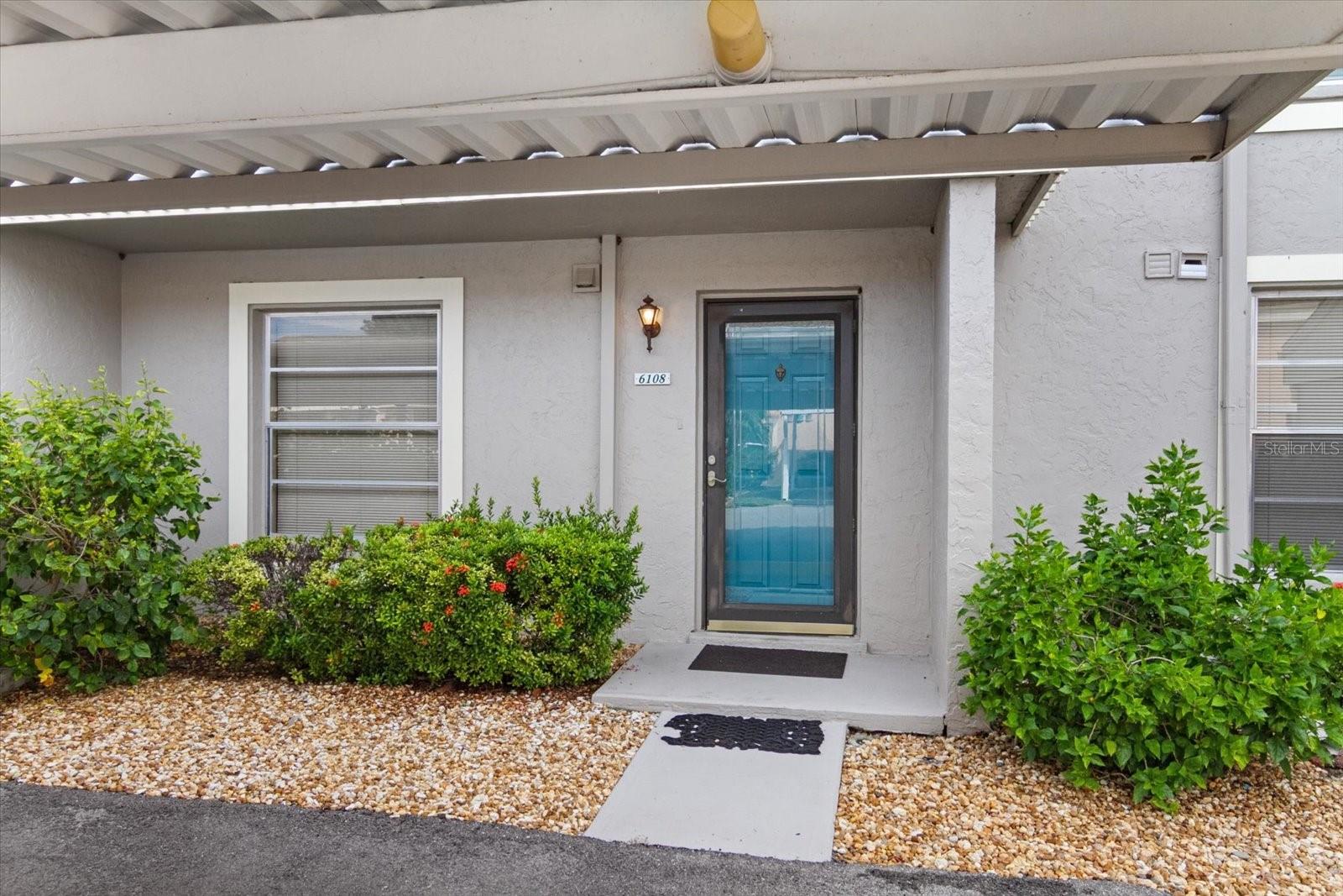 MAJOR PRICE REDUCTION! Sought after GROUND FLOOR  3 bedroom condo in lovely Pebble Springs.  Looks can be so deceiving here. When you drive in, you will see the well maintained entrances and carports. But enter this lovely and light unit and you will see your backyard oasis. Step out of your screened lanai and walk just steps to the gorgeously landscaped pool.  Split floorplan, immaculately kept and tastefully furnished. The bonus is a BRAND NEW ROOF  which the SELLER is paying for, a new hot water heater in 2024.  What more can you ask for?
