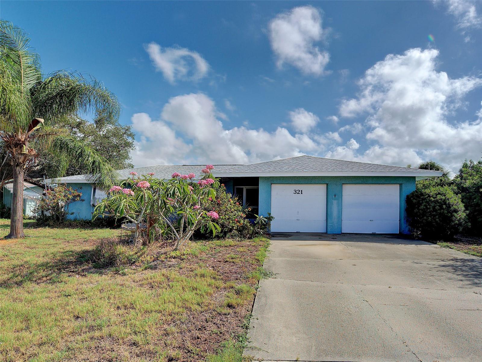 BEAUTIFUL DIRECT VIEWS OF SHAMROCK LAKE - THIS PROPERTY GIVES YOU AN EXPANSIVE SCENIC LOCATION ON INTERSECTING CHAIN OF LAKES. FLORIDA CHARMER - ESTATE PROPERTY -FIRST TIME FOR SALE AND AVAILABLE IN OVER 33 YEARS! THE POTENTIAL IS HUGE! THE LOT HAS WONDERFUL ESTABLISHED LANDSCAPE AND BEAUTIFUL TREES IN BLOOM. 
Just under 1300 square feet, this is a 2 bedroom, 2 full bath home with a highly desired split bedroom plan.
Some windows have been replaced - AC Replaced in 2019 - Re-pipe of H/C water Lines in 2012 - New Roof in 2024. Bring your desire to put the love back into this 60's charmer with original vintage tiled bathrooms and double garage! 
WOW - UNIQUE AND HARD TO FIND - NEIGHBORHOOD PERK - OPTIONAL MEMEBRSHIP TO VENICE GARDENS COMMUNITY CENTER WITH POOL AND PLAYGROUND. YEAR ROUND ACTIVITIES!  JUST UP THE ROAD. READY FOR THE NEXT LUCKY OWNER. CALL NOW FOR A PRIVATE SHOWING.