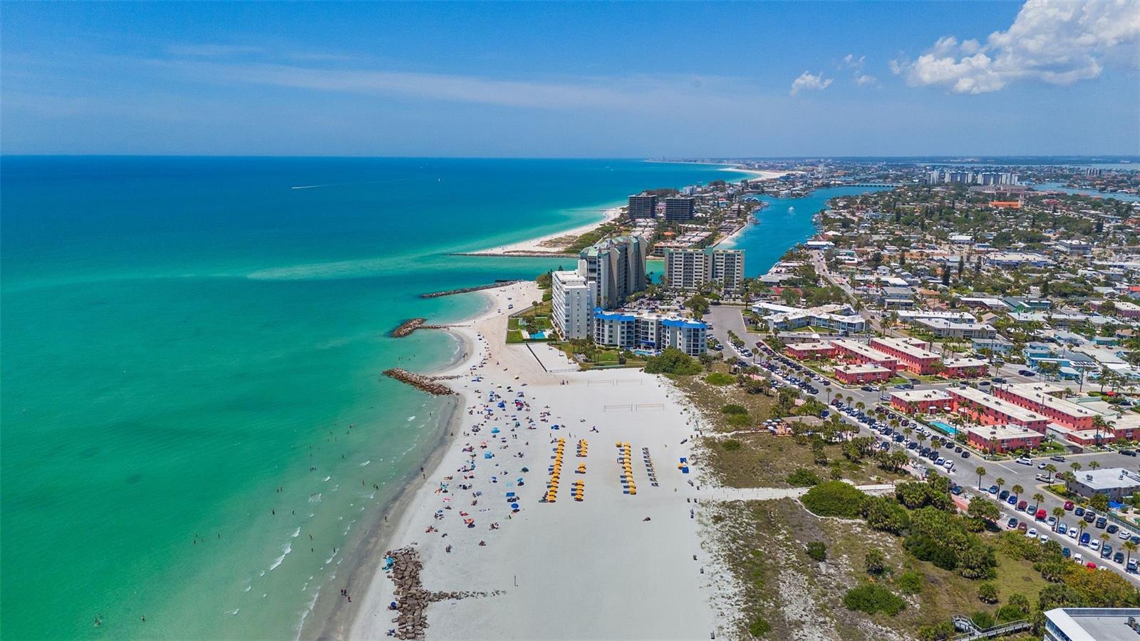 HUGE PRICE IMPROVEMENT! Very Motivated Seller. Will consider all reasonable offers. Now, is your best opportunity to buy this most desirable great value Beach condo, before Fall Beach home shopping season and prices go back up! Renovated spaces. Just 1 block from Upham beach and the Gulf. The owner will accept a purchase or a lease purchase ("rent to own"...Move in now and Close on the purchase in a year!). Inquire for the full details. Enjoy your winter retreat and/or your all year round beach life sanctuary! Values like this in this cozy, 14 unit, boutique condominium community here at Sunset Plaza East do not come available very often. And with this great price, purchase or lease purchase, and this most desirable “walk to all” beach community location, this is a rare find and a one-of-kind value. You won’t find a beach setting and price like this right across from the sugary white sands of the Gulf of Mexico (across Upham Beach) in St Pete Beach (Rated #1 Beach in the US!). There's nothing like it on the beach at this price! This top floor unit (#11) is move in ready, furnished with an open concept kitchen/dining area, and just a few steps walk to the beach, restaurants and beach nightlife. You can make this your Florida winter beach retreat, investment property or your full year beach home by the Sea. This surprisingly spacious, completely furnished beachy condo shows pride of ownership throughout with a new water heater, new stove, new Frig and Hurricane rated windows (no need for shutters!) The home has excellent natural light in the living area and in the full bedroom. There is a laundry facility on premises and an over-sized extra storage unit for all your beach toys! There is also a quiet outdoor seating/picnic area and shower behind the building. This home can comfortably sleep up to 4 adults with plenty of living room space for a day bed or sofa sleeper. You'll love the great fishing spot right across the street at Sunset Park. All assessments have been paid. The building was just painted, a new roof put on and the whole parking lot just paved! Enjoy the Sunday Market & Art Fairs of Corey Avenue and jump on a Free Beach golf cart ride day or night to quickly get up & down Gulf Blvd and all the activities the area has to offer. Downtown St Petersburg is only a 15 minute ride for more upscale restaurants, shopping, museums & the new Pier. And as a bonus, the monthly condo fee includes cable & internet. Make this your home, beach getaway or investment property. 3 month minimum on rentals. Live the Beach Life all year long! Just slip on your flip flops, step out of your front door and stroll a few steps to Upham beach, or one of the many local bars and restaurants where you can sip a margarita and listen to a few Jimmy Buffett tunes. It's ideally located to access all the beach amenities as well as a quick drive to Fort De Soto National Park, and Downtown St. Pete to visit cultural attractions. Come take a tour today!