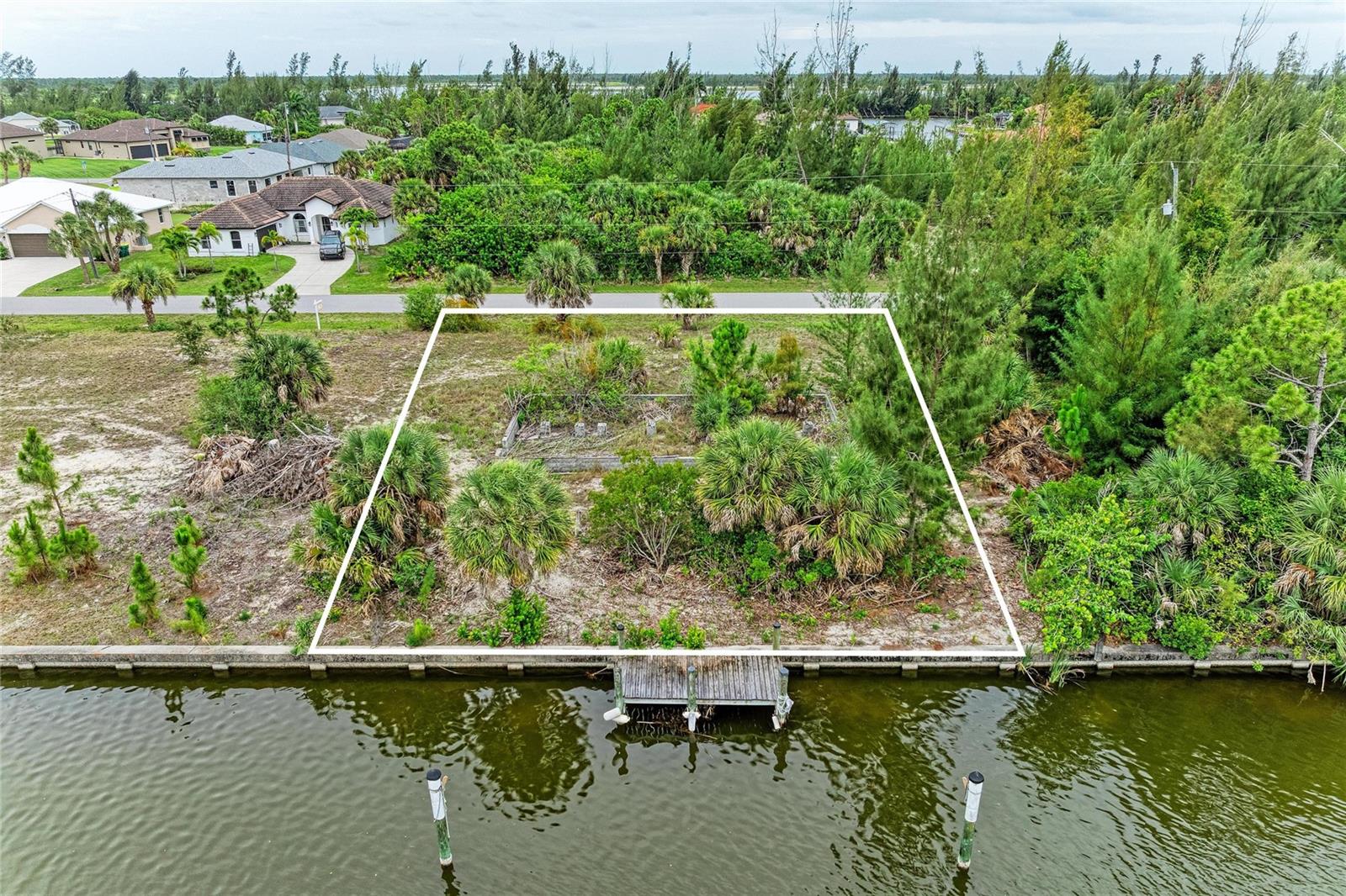 Build your Florida waterfront dream home on one of the best-priced sailboat-access lots in all of South Gulf Cove! This oversized quarter-acre waterfront homesite offers true sailboat water with no fixed bridges and direct Gulf access, providing an exceptional opportunity for boating enthusiasts to enjoy unrestricted access to Charlotte Harbor and the Gulf of Mexico.
Situated in the highly desirable waterfront community of South Gulf Cove, this property offers the perfect blend of peaceful coastal living and convenient access to nearby Gulf beaches, golf courses, shopping, dining, entertainment, and world-class fishing. Public water and sewer are available, and with numerous new homes being constructed throughout the area, now is the ideal time to secure your piece of Southwest Florida paradise.
Residents can enjoy community parks, walking paths, boat ramps, and an active boating lifestyle. South Gulf Cove also features a voluntary homeowners association, allowing property owners the option to participate in community events and amenities without mandatory HOA obligations.
Whether you’re planning to build your forever home, seasonal retreat, or investment property, this exceptional waterfront lot offers outstanding value in one of Port Charlotte’s most sought-after boating communities. Rarely do opportunities like this come available offering sailboat water, no fixed bridges, and direct Gulf access at such an attractive price point.
