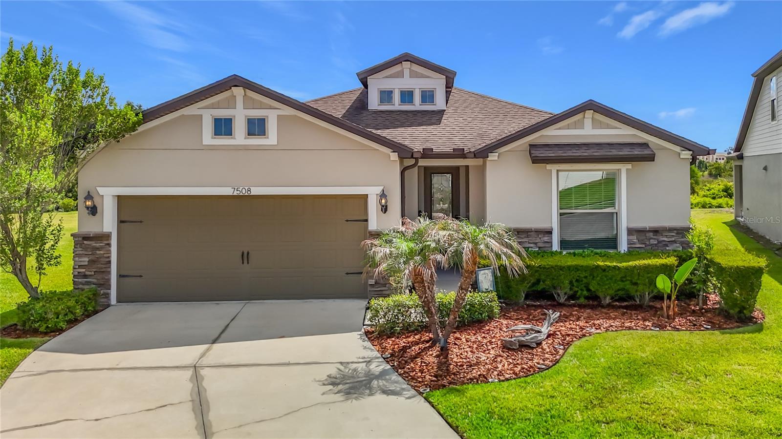 Under contract-accepting backup offers. WELCOME TO FLORIDA- YOU WILL LOVE THIS POOL HOME IN A GATED, LAGOON COMMUNITY- EPPERSON! This beautifully upgraded 3-bedroom, 2-bath, 2.5- Car Garage which includes space for a golf cart or extra storage. There is 1,871 square feet of thoughtfully designed living space and the perfect blend of luxury, comfort, and Florida lifestyle. Step inside through the etched glass front door and be greeted by a large foyer leading to an open-concept layout. The heart of the home is a stunning gourmet kitchen featuring a cooktop range with hood, custom backsplash, large quartz island with pendant lighting.  You will enjoy the spacious custom pantry that offers plenty of storage. The living area is enhanced with surround sound and expansive zero corner sliders that open to an extended covered lanai with privacy screens, overlooking a peaceful conservation view. Take a dip in your private pool, beautifully accented with trim lighting for the ultimate evening ambiance which also includes the sound of the pool waterfall along with surround sound speakers. The primary suite is a true retreat, complete with a tray ceiling, ensuite bathroom and a custom-designed closet for optimal organization. The primary bathroom has dual sinks, a linen closet along with a “super shower”.   The front hall has a “drop zone” to hang coats and store shoes, and it leads to an large laundry room which has plenty of extra storage space . Additional features include 8-FOOT DOORS, EV CHARGER, GUTTERS, WATER SOFTENER, and a SECURITY SYSTEM for added peace of mind. All TVs with mounts are included—making this home truly move-in ready. The HOA fee of $261/quarterly ($87/month) includes Cable and UltraFi high-speed internet, offering a low-maintenance lifestyle. Residents enjoy exclusive access to the Epperson Lagoon, featuring sandy beaches, cabanas, a swim-up bar, paddle-boarding, kayaking, AquaBanas, obstacle course and a full calendar of year-round community events. The golf cart community offers playgrounds, dog parks, Eagle’s Nest Park, and scenic golf cart paths. You can drive your golf cart to the Lagoon, Publix, Chick-fil-A and Starbucks. Epperson is conveniently located approximately 35 minutes from Downtown Tampa, 45 minutes to Tampa International Airport, and approximately one hour to the Gulf beaches and the Orlando area. Nearby top-rated schools include Innovation Preparatory Academy and Kirkland Ranch Academy of Innovation. All information is deemed accurate. Buyer and Buyer’s agent should be verify.