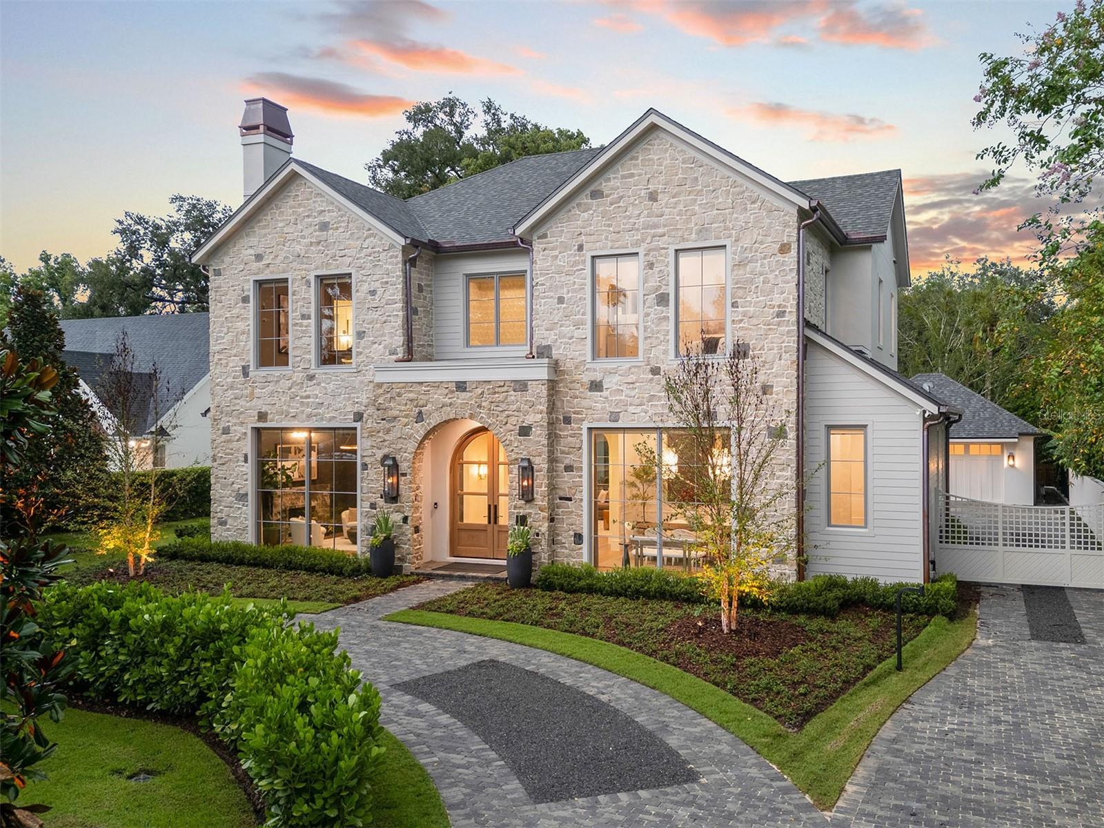 PROUDLY PRESENTING THE WINTER PARK VIA's NEWEST ADDITION TO THE LUXURY HOME MARKET ...BUILT BY M. LAHR HOMES!  Prominently sited on a fantastic lot, this custom home has come together perfectly as a unique, awe-inspiring estate offering an unparalleled combination of function, elegance, and aesthetics.  The home boasts a very well thought out design with finishes and features that showcase professional design planning at a very high level.  There is even more detail, function, and quality than what is typically available in the Winter Park New Construction market.  Offering a great combination of an expansive living area, large bedrooms, and unique spaces accented by three (3) feature fireplaces, the house feels nothing less than a resort.  Expansive glass from the oversized doors and windows flood the home with natural light and create a dramatic exterior evening presentation.  The entire main floor living area opens perfectly out to the large covered patio, back yard, and the pool/spa area making this entire area a beautiful four (4) season extension of the interior living space.  The floor plan features a private ground floor primary suite, four (4) additional large bedrooms (all with private baths and walk-in closets), and numerous sitting areas/loft/dining spaces that can be utilized to suit multiple needs!  Please see floor plans attached and CLICK ON TOUR LINK FOR A COMPREHENSIVE VIDEO WALK THROUGH . You will not find a better opportunity to secure a highly detailed, unique, luxury home in the WP area that offers the feel, presentation, and function of 1229 Via Del Mar.  Located in the desirable Winter Park Via's location in top rated Dommerich/Winter Park School District and minutes to WP Raquet Club, Park Ave. Shopping, Winter Park Village,  DT Orlando, Advent Health, ORMC and more.  An exquisite Luxury Estate in one of Central Florida's most dynamic areas!