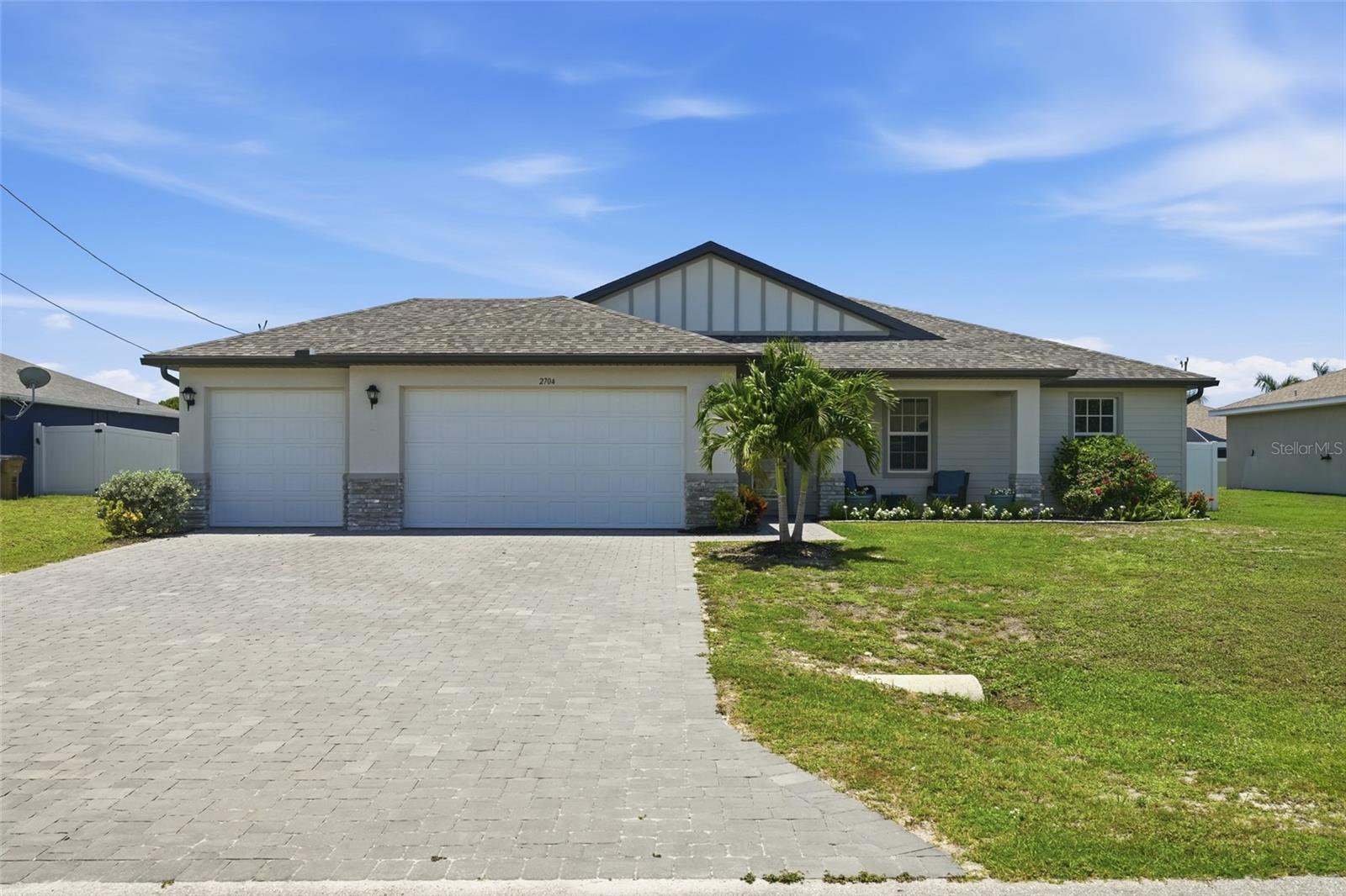 Experience the best of Southwest Florida living in this beautifull TURN-KEY 3-bedroom, 2-bathroom pool home with a den and 3-car garage in Cape Coral. Designed with both comfort and entertaining in mind, this move-in-ready residence features a bright, open floor plan, soaring tray ceilings, and seamless indoor-outdoor living. Whether you're searching for a year-round residence, seasonal retreat, or investment opportunity, this home offers the perfect blend of style, functionality, and resort-style amenities.

HOME FEATURES
• Turn-Key
• 3 Bedrooms
• 2 Bathrooms
• Den/Flex Space
• 3-Car Garage
• Bright Open Floor Plan
• High Tray Ceilings
• Tile Flooring Throughout Main Living Areas
• Open Living Room with Sliding Glass Doors to Lanai
• Hurricane Impact Windows and Doors
• Irrigation System

KITCHEN FEATURES
• Stainless Steel Appliances
• Tiled Backsplash
• Large Kitchen Island
• Breakfast Bar
• Closet Pantry
• Open to Dining Area

PRIMARY SUITE
• Spacious Primary Bedroom
• Dual Walk-In Closets
• Private Ensuite Bathroom
• Dual Sink Vanity
• Walk-In Shower

GUEST ACCOMMODATIONS
• Split Bedroom Floor Plan
• Built-In Closets
• Shared Guest Bathroom Nearby

DEN/FLEX SPACE
• Ideal Home Office
• Media Room
• Hobby Room
• Potential Additional Sleeping Space for Guests

OUTDOOR FEATURES
• Screened Lanai
• Heated Saltwater Pool
• Private Spa
• Plenty of Space for Outdoor Entertaining

FULLY FENCED BACKYARD
• Added Privacy
• Secure Space for Pets to Play
• Ideal for Outdoor Activities and Gatherings
• Enhanced Security and Peace of Mind
• Defined Outdoor Living Space

Enjoy everything Cape Coral has to offer, including world-class boating, fishing, golf, waterfront dining, shopping, entertainment, and convenient access to the Gulf Coast's beautiful beaches. This exceptional furnished pool home is ready for you to start enjoying the Florida lifestyle from day one.