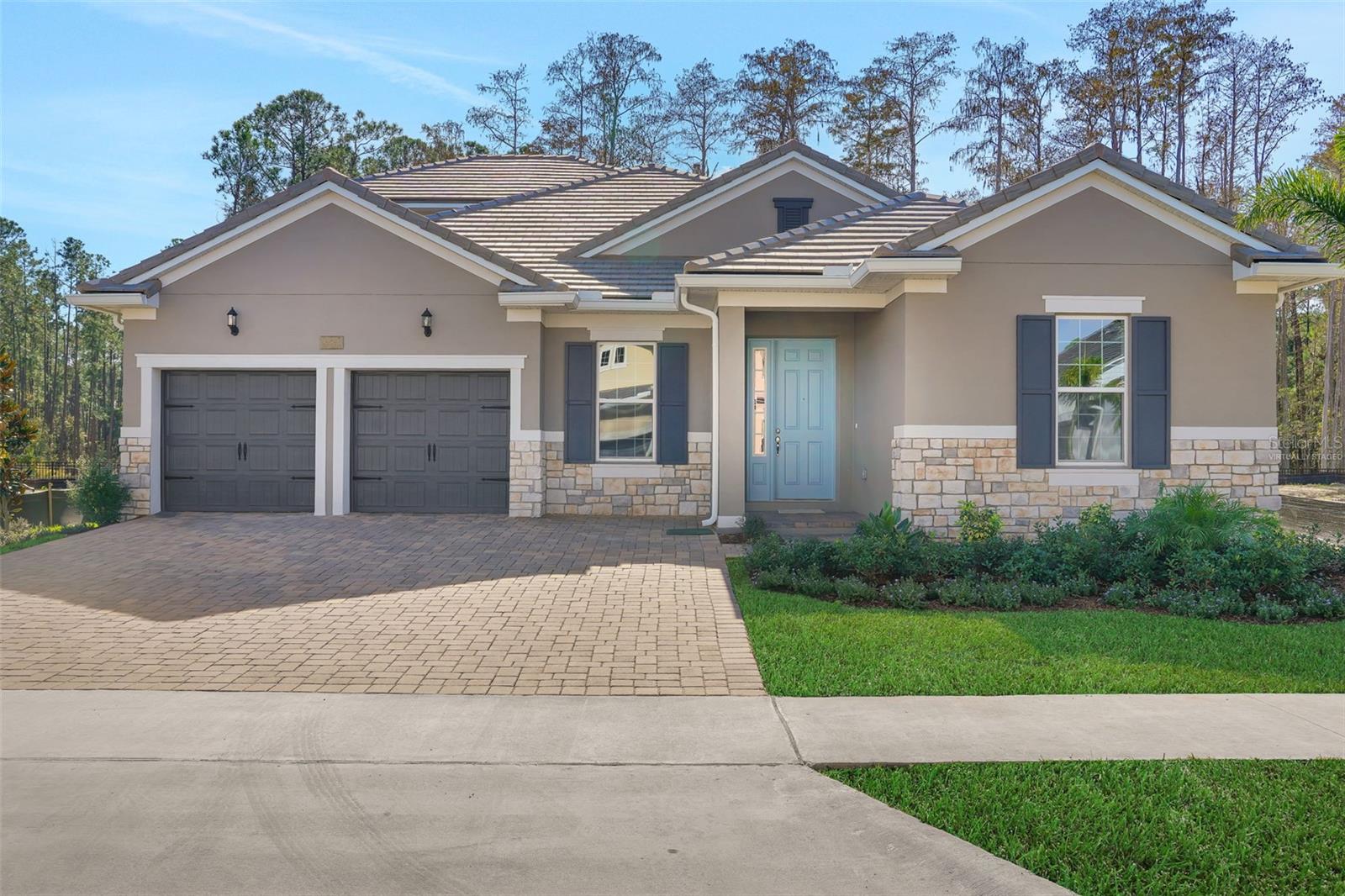 One or more photo(s) has been virtually staged. Under Construction. Sample Image Arlington Floorplan – 2,740 Sq. Ft. | 4 Beds | 3 Baths | 2.5-Car Garage  a thoughtfully designed, 1-story home by Dream Finders Homes that perfectly blends luxury, functionality, and comfort. This brand new 2,740 square foot residence sits on a wooded lot, offering expansive indoor and outdoor living space, ready for immediate move-in. Key Features:4 Spacious Bedrooms: Designed for privacy and flexibility, including a luxurious owner’s suite with spa-like en-suite bathroom and large walk-in closet.3 Full Bathrooms: Modern finishes with quartz countertops, tile flooring, and upgraded fixtures throughout.Gourmet Kitchen: A chef’s dream featuring built-in stainless steel appliances, a large center island, upgraded cabinetry, quartz countertops, a walk-in pantry, and designer lighting – perfect for hosting or everyday meals.Open-Concept Living: The heart of the home flows seamlessly from the kitchen to the dining area and large family room, all overlooking the covered lanai for indoor-outdoor living. 2.5-Car Garage: Ample space for two vehicles plus additional storage or hobby area.Oversized Lot: Extra space for a garden—ideal for entertaining or relaxing. Projected Completion July/August. Preferred Lender incentives apply.