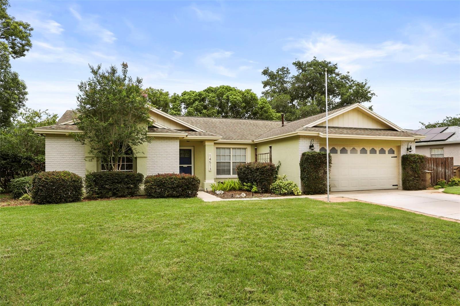 Move-in ready and thoughtfully updated, this spacious 4-bedroom home offers a versatile floor plan with formal living and dining areas, vaulted ceilings, and durable laminate and tile flooring throughout. The open-concept kitchen features granite countertops, stainless steel appliances, natural gas cooking, and overlooks the family room with a cozy fireplace, creating an ideal space for everyday living and entertaining. The expanded floor plan provides generously sized bedrooms, while built-in features in the fourth bedroom offer flexibility for a home office, hobby room, or guest space. The secondary bathroom includes dual sinks for added convenience. Upgraded lighting and ceiling fans can be found throughout the home. Enjoy outdoor living on the oversized screened porch overlooking a beautifully landscaped backyard complete with a gazebo, storage shed, and mature trees that provide abundant shade and privacy. Conveniently located near shopping, dining, parks, schools, and major roadways, this well-maintained property offers comfort, functionality, and outdoor enjoyment in an established Clermont community.