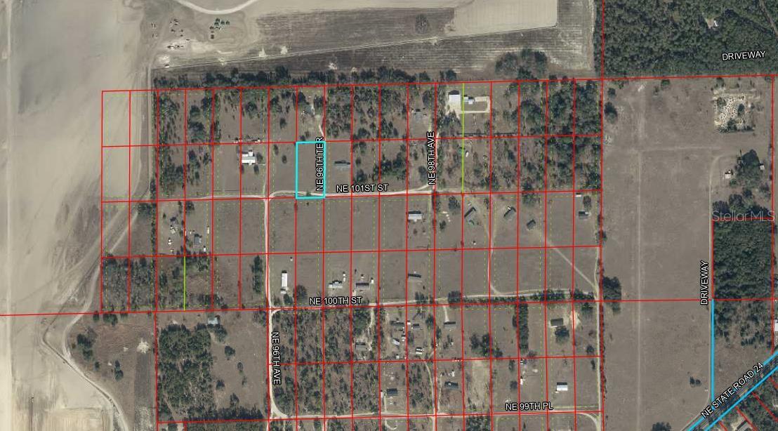 DISCOVER THE PERFECT BLEND OF COUNTRY LIVING AND CONVENIENCE on this beautiful 1.25 acre parcel in the Diversified Properties area of Levy County Archer, Florida! Located just across from the local race track, this former cow pasture offers a level, open landscape that has been naturally cleared, providing an excellent canvas for your custom home, manufactured home, or future investment. Enjoy the peace and privacy of rural living while being only a short drive from Gainesville, where you'll find major shopping, dining, healthcare, the University of Florida, and countless entertainment options. With plenty of room for a home, workshop, garden, or recreational space, this property is an outstanding opportunity to create the lifestyle you've been looking for in a growing North Central Florida location.