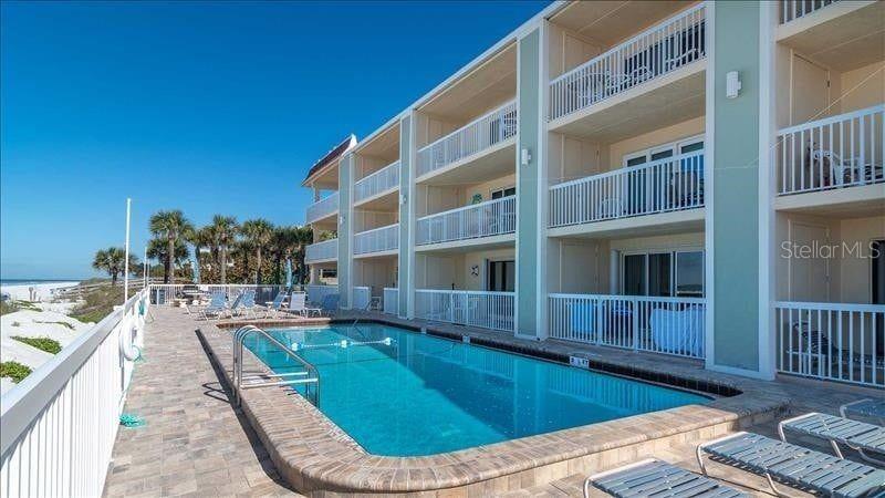 Your beachfront retreat is waiting for you! Fully remodeled condo right on the beach. This fully furnished property with breathtaking views of the Intracoastal is also located directly on the Gulf. Updated kitchen with granite counters, new luxury tile flooring, no popcorn ceilings or carpet, and a fully tiled bathroom with a large walk-in shower and extra-wide vanity. Additional features include a heated towel bar, updated furniture with a king-size bed, and a leather sleeper sofa.
The unit offers a full owner’s closet in the bedroom, a full-size owner’s pantry, and an additional exterior owner’s closet—perfect for keeping your personal items on-site while renting the property for extra income. Includes an updated smart TV and modern light fixtures with retractable fans. This highly reviewed unit in the complex has returning tenants year after year.
The community features a year-round heated pool with direct beach access. Low HOA fees for a beachfront property! An on-site management company can assist with rentals, or you can manage it yourself. Very solid community with on-site management.