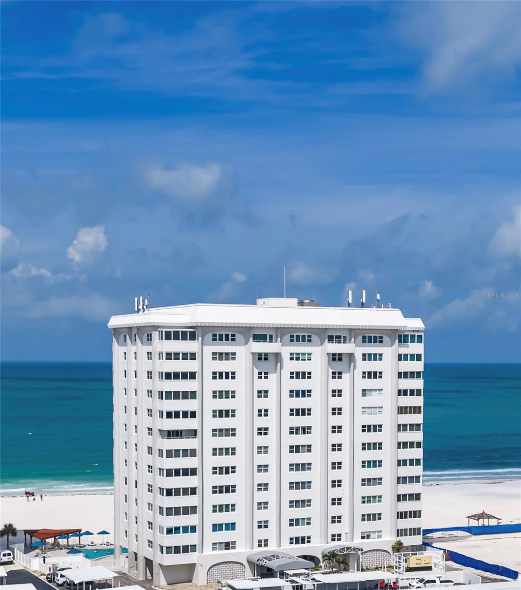 Spectacular Waterfront Living with Panoramic Views!  

Experience the best of Sarasota's coastal lifestyle in this beautiful, fully furnished, move-in-ready 10th-floor condominium, offering breathtaking, unobstructed views of the nature preserve, Sarasota Bay, and the city skyline. Thoughtfully designed, this spacious 1-bedroom, 1½-bath residence features an open floor plan that maximizes natural light and showcases the stunning scenery from nearly every angle.
 
The inviting living area offers ample space for relaxation and entertaining, while a dedicated home office provides the ideal setting for remote work, complete with a wall of built-in cabinets for ample storage. An elegant dining area flows seamlessly into the fully equipped kitchen, which features electric appliances and a generous kitchen island.
 
Designed for comfort and peace of mind, the residence features hurricane-impact windows, a new HVAC system, and a new water heater. The building has undergone numerous recent upgrades, further enhancing its value and appeal.
 
Located on a premier private beachfront on Lido Key, the community offers residents resort-style amenities, on-site management, secure building access, and assigned covered parking. It is just minutes from the renowned shops and restaurants of Saint Armands Circle and the vibrant cultural and entertainment district of downtown Sarasota.
 
Whether you're seeking a year-round residence, a seasonal retreat, or an investment opportunity, this exceptional condominium offers stunning views, modern updates, and an unbeatable location within one of Sarasota's most desirable beachfront communities.