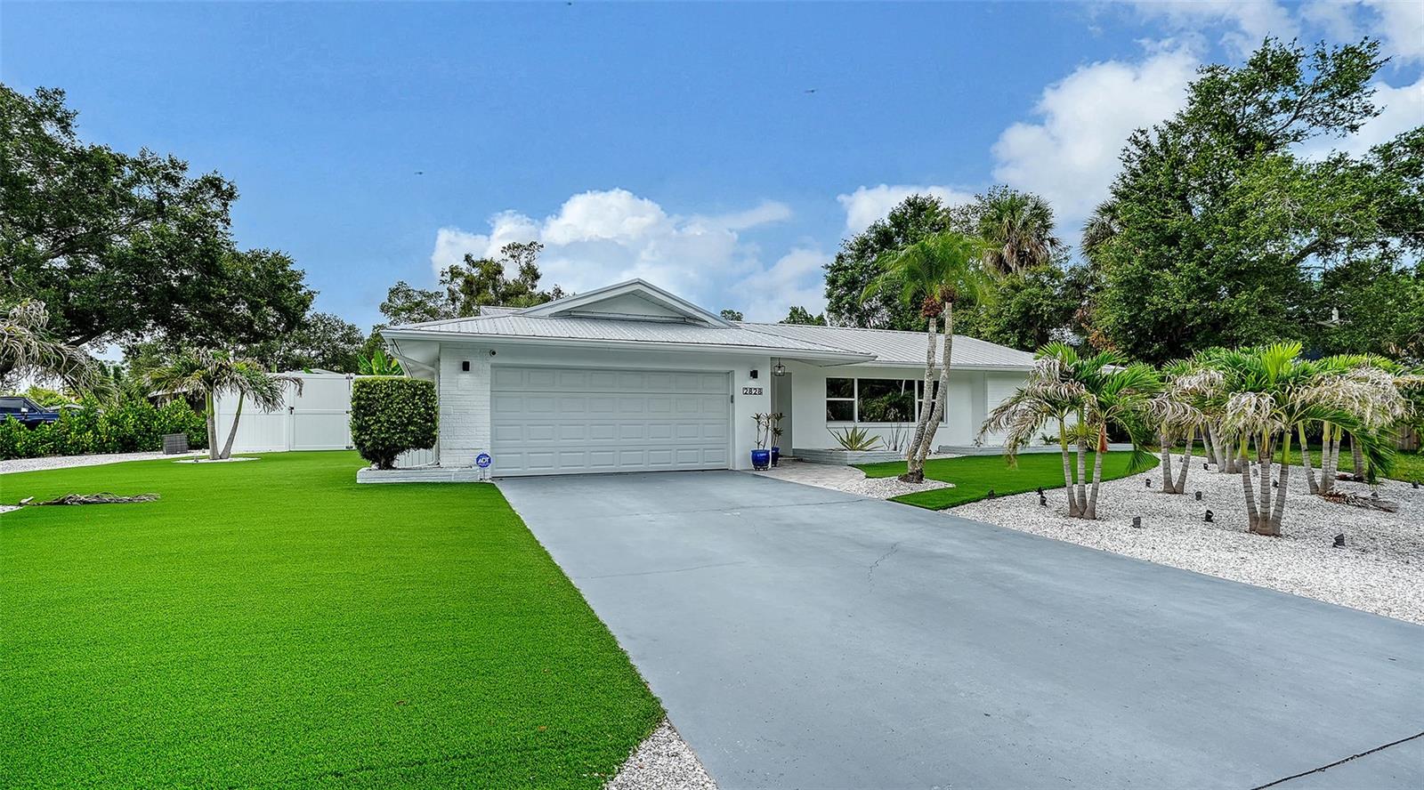 Welcome to 2828 Suncrest Dr, a beautifully updated South Gate pool home offering comfort, privacy, and true Florida indoor-outdoor living. Situated on a spacious corner lot near the end of a quiet cul-de-sac, this 2-bedroom, 2-bath home features 1,551 sq. ft. of living space, an oversized two-car garage, and a versatile bonus room perfect for a home office, den, or flex space.
Inside, you’ll find updated flooring throughout, a renovated kitchen with dark cabinetry, updated countertops, modern hardware, pantry storage, and a convenient pass-through window to the patio. Pocket sliding glass doors open to the pool area, creating a seamless flow for entertaining and everyday living.
The split floor plan provides privacy between the spacious bedrooms, both featuring walk-in closets. The primary bathroom has been tastefully updated with dual sinks, a frameless glass walk-in shower, and modern finishes.
Step outside to your private backyard retreat featuring an in-ground pool, partially covered patio, newer pool cage screens, low-maintenance turf instead of grass, a stand-alone sauna, and newer 8-foot privacy fencing surrounding the backyard. The turf makes the yard easy to maintain while still providing a clean, beautiful outdoor space to enjoy year-round.
Located in the desirable South Gate area, this beautifully updated home is convenient to Siesta Key, Downtown Sarasota, shopping, dining, beaches, and the best of Sarasota living. Come check it out today!
