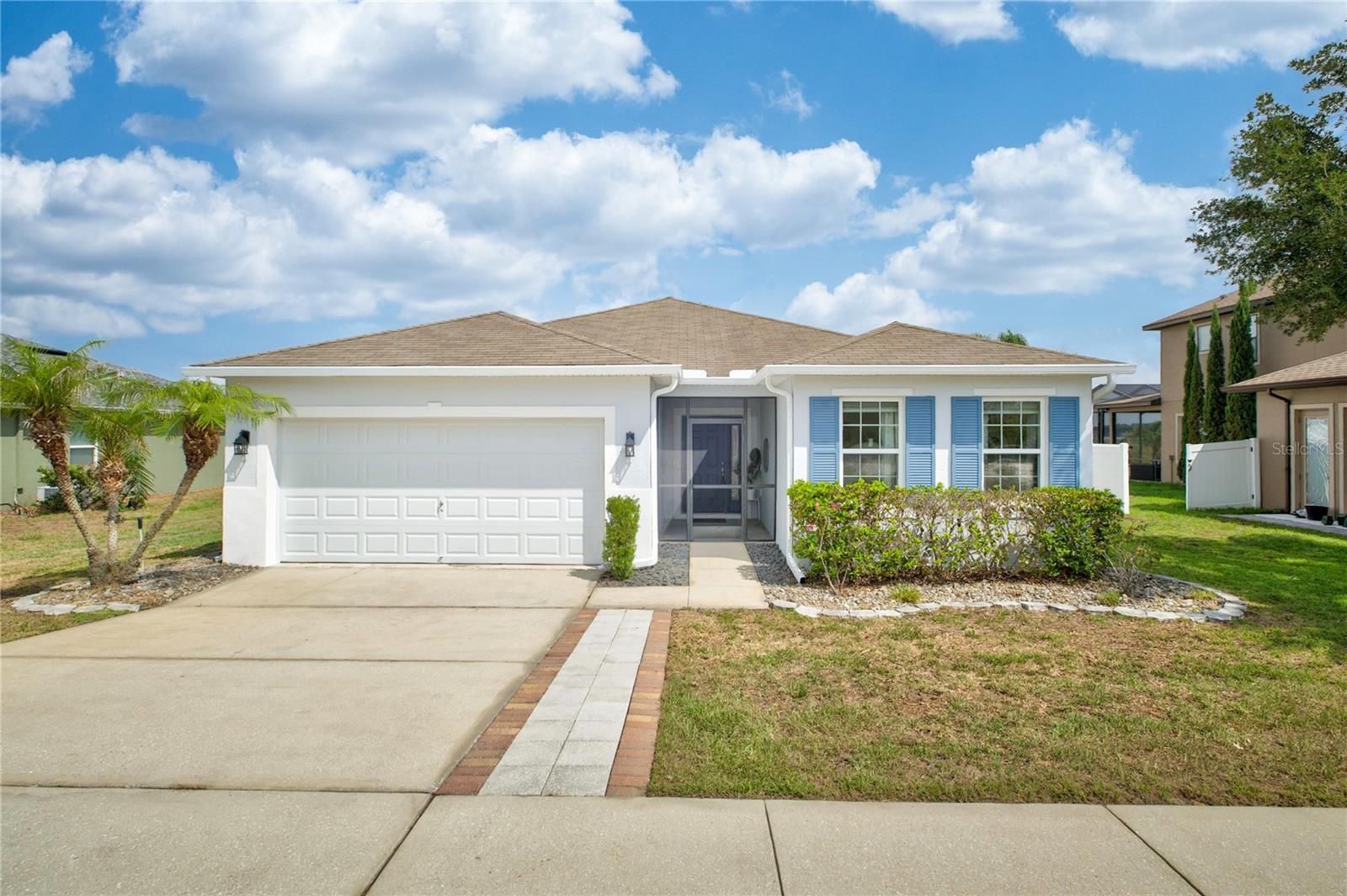 Enjoy the ultimate waterfront lifestyle in this beautiful 3-bedroom, 2-bathroom home, perfectly situated on a generous 0.43-acre lot overlooking Cherry Lake. Offering 1895' of living space with the added financial benefit of a low HOA and no CDD fees. The home features a spacious, open-concept split floor plan with low-maintenance ceramic tile flooring throughout. The large Great Room provides excellent flexibility to serve as an oversized living area or a formal living and dining combination, while a separate breakfast nook offers a bright space for daily dining next to the kitchen with its stainless-steel appliances. Additional interior highlights include a dedicated indoor laundry room and a primary bathroom featuring modern updates completed in 2020 and new water heater 2025.

The outdoor space is the true highlight, featuring direct canal access to the skiable waters of Cherry Lake.  The HOA allows for private docks to be built, offering the perfect opportunity to customize your lakefront experience. Out back, a large screened in lanai, complete with soaking spa, leads to a fenced-in yard—making it the perfect spot to unwind and watch the sun go down over the water.