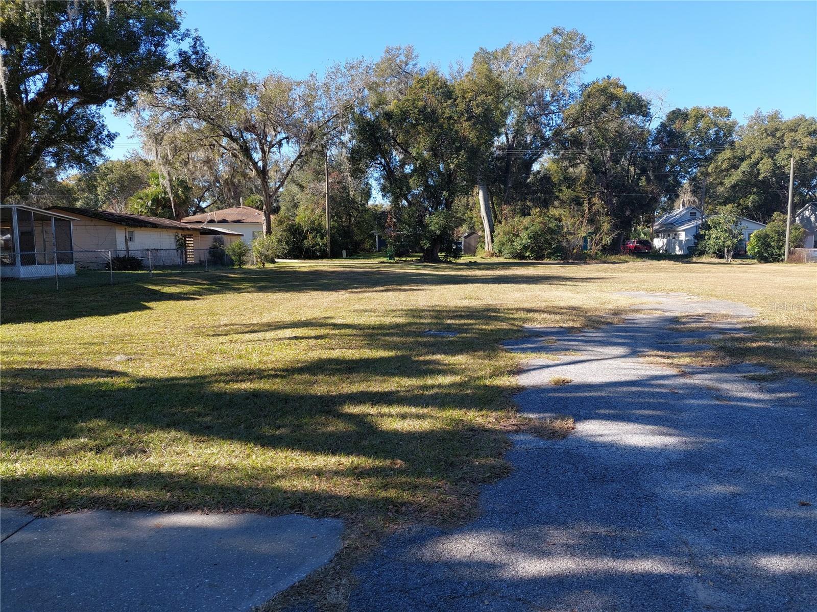 Here is almost impossible to find multifamily zoned duplex lot in the of city Zephyrhills that is walking distance to library and city offices or downtown area. Convenient to everything you need. No HOA rules or CDD only city rules to follow! High and dry lot in great market for any rental investment or great place to build for Multi generational living as can build and live in both sides or vacation to as 2nd homes. Has some impact fee credit available too, I was told when you want to build that once you submit for permit can get amount of credit from building dept. And i have 3 bed rm 2 bath with single car garage each side blue print done and previously had been approved by CRA director of Zephyrhills, should be ready now for you to start submitting for permitting. Can buy this and choose your own builder when your ready. Wow! Normal 30 yr financing on duplex just like a house makes it more convenient and easier to afford or cash flow. Or as builder can build and might be able to ask city to allow town home style affordable housing sales. No other city wat & sew duplex lot like this available in Wesley Chapel or Zephyrhills or PASCO cty today under $200k that I could find! NO HOA or CDD! Adjacent lot owned same owner is identical has different address assigned that also can be bought as pkg deal with right offer! Then you could have four units and can build same duplex blueprint on both lots! A lot in Tampa allowing for 2 duplexes under $300k cant be found, so buy here now and you could finance each duplex seperately and build seperately at your convenience and get lower residential loan interest 1-4 unit financing this way when done! Right to use previously allowed blueprint plan will be included with sale or get your own print made do your thing. Has paved alley access behind lots. Owner related to agent. Sign is on left lot toward the corner as lot facing 12th. Other vacant identical lot is to right. Can discuss 1031 if desired!