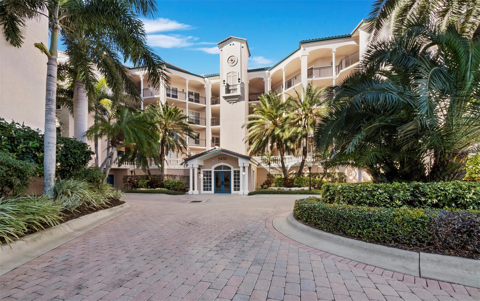Welcome to Eagles Point at The Landings, one of Sarasota’s established and sought-after gated waterfront communities, is known for its lush landscaping, privacy and resort-style amenities. This spacious and sun-filled three-bedroom, two-and-a-half-bath residence enjoys peaceful west-facing views over mangroves, where soaring birds and nightly sunsets create a constantly changing natural backdrop. A screened lanai and private terrace extend your living space outdoors, ideal for morning coffee or evening wine. Inside, the layout lives large with generous rooms and great flow. The dine-in gourmet kitchen features an island, built-in desk, abundant cabinetry and newer appliances. The primary bedroom suite offers a retreat with dual sinks, whirlpool tub, walk-in shower, separate water closet and walk-in closet. Two additional bedrooms provide ideal flexibility for guests, a home office or hobbies. A rare bonus, two dedicated parking spaces, plus ample guest parking. Residents of Eagles Point Circle enjoy their private pool and grilling area, along with full access to The Landings Racquet Club, featuring eight Har-Tru tennis courts, pro shop, Junior Olympic pool, spa, fitness center, and an active calendar of social and educational events. Nature enthusiasts will appreciate the community's path leading to kayak storage with easy launching access to the Intracoastal Waterway. Private. Sunny. Move-in ready. A relaxed, maintenance-free lifestyle in the heart of Sarasota.